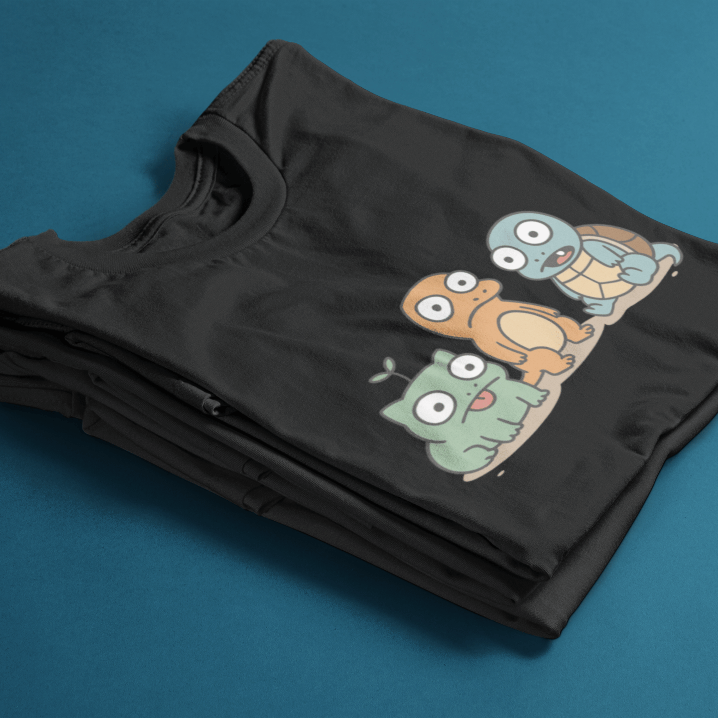 folded funny pokemon t-shirt with derpy starters