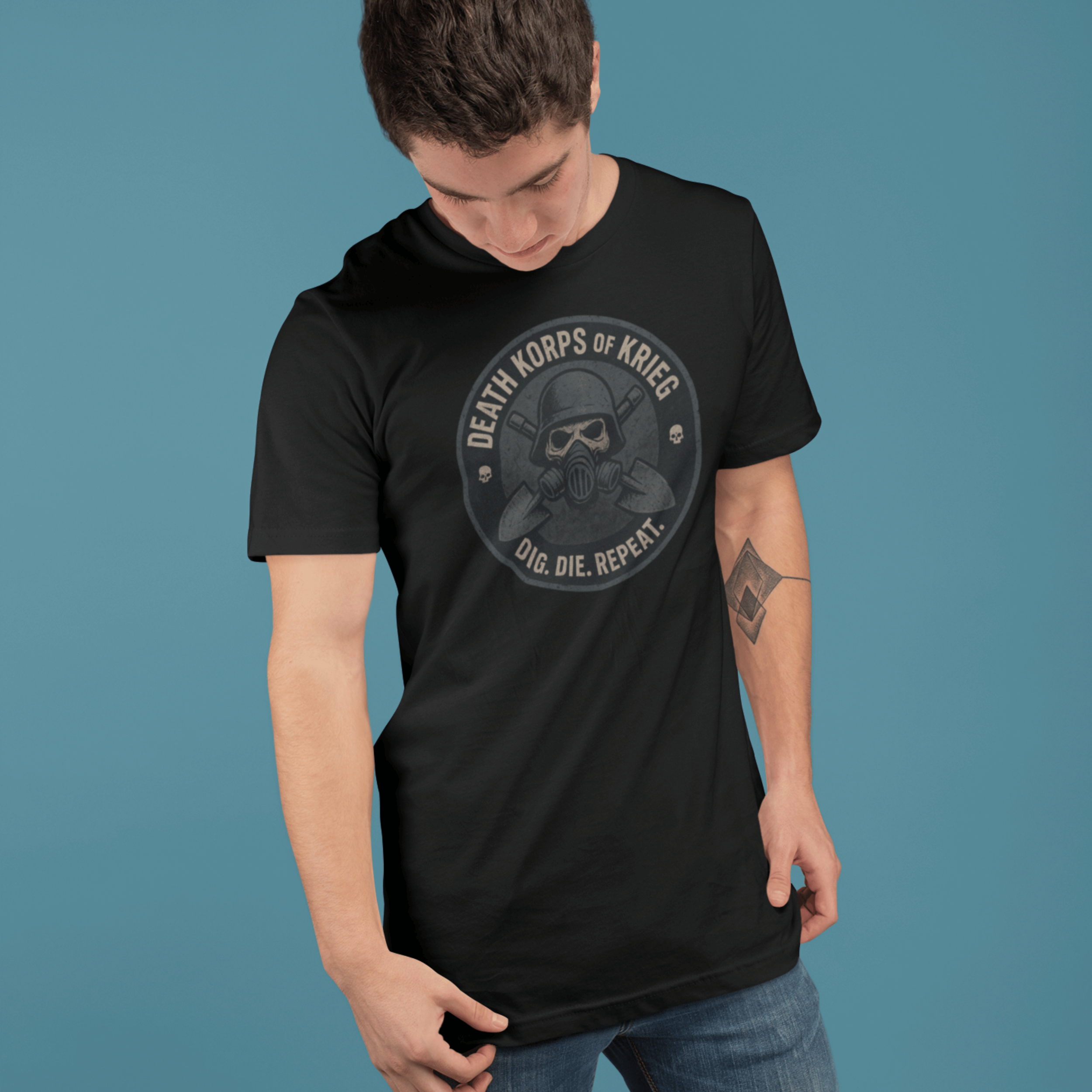 close up of man wearing Warhammer 40k death korps of krieg tshirt with skull and "dig die repeat" slogan