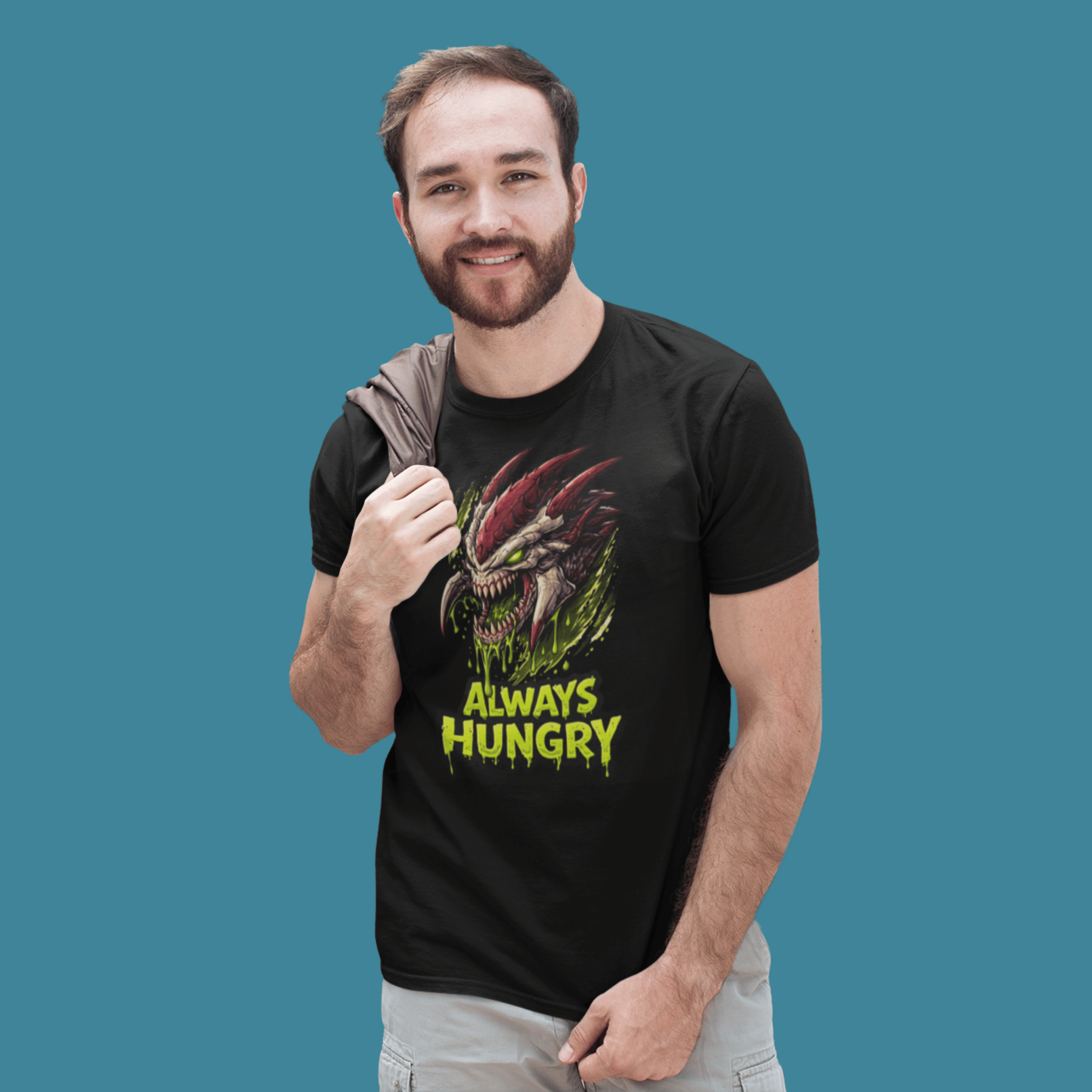 man smiling wearing Warhammer 40k Tyranids t-shirt with "Always Hungry" slogan