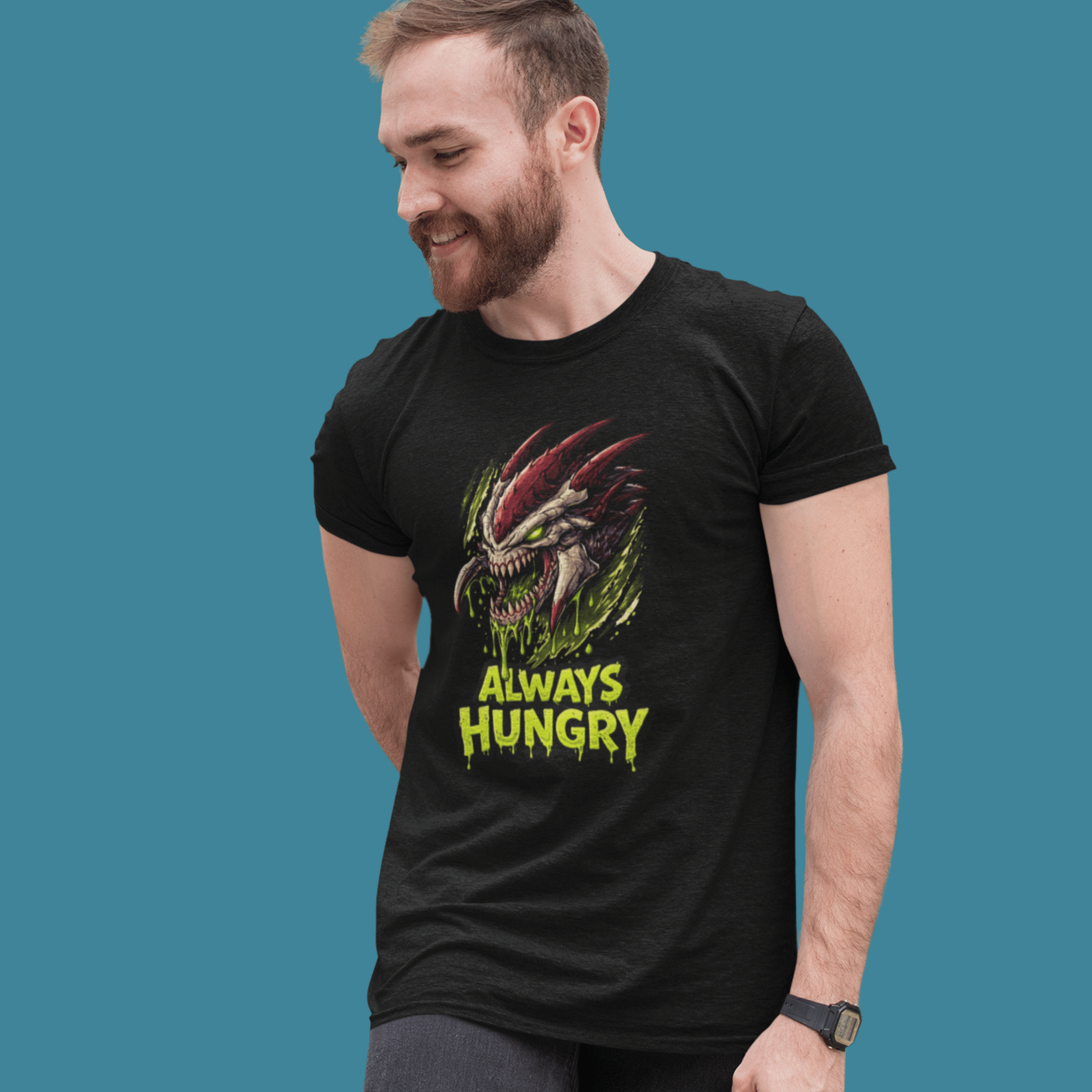 man wearing Warhammer 40k Tyranids t-shirt with "Always Hungry" slogan