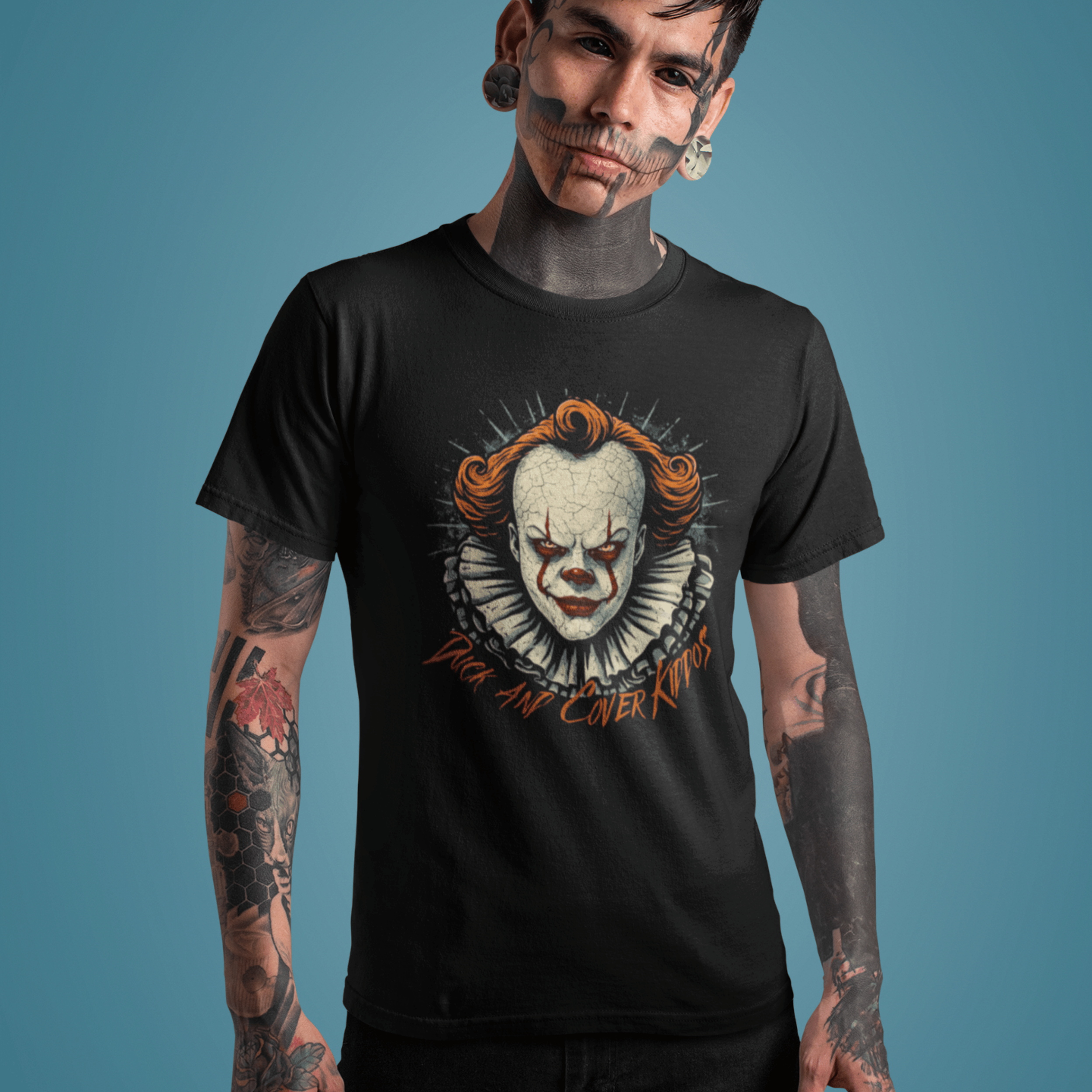 T-shirt for horror movie lover with Pennywise the clown and text "duck and cover kiddos"