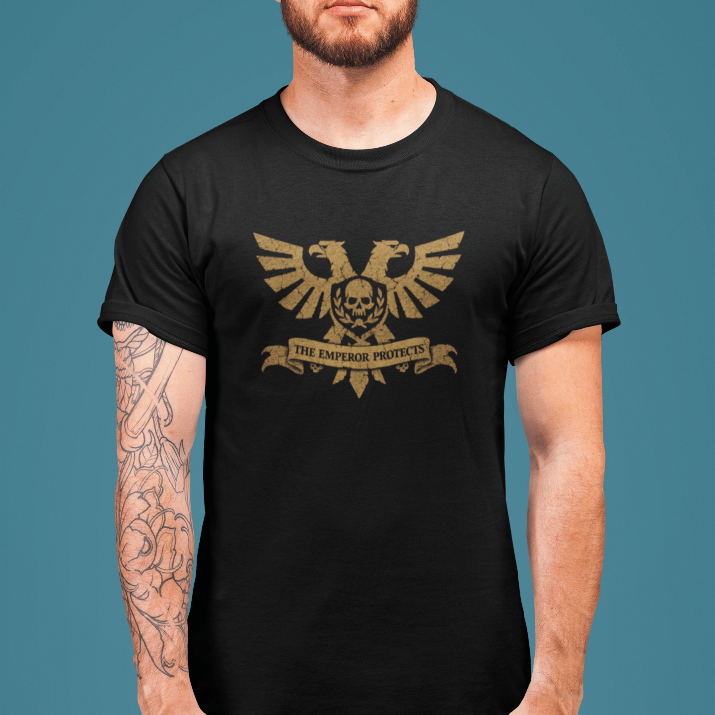 close up of man wearing Warhammer 40k tshirt with aquila and classic quote "the emperor protects"