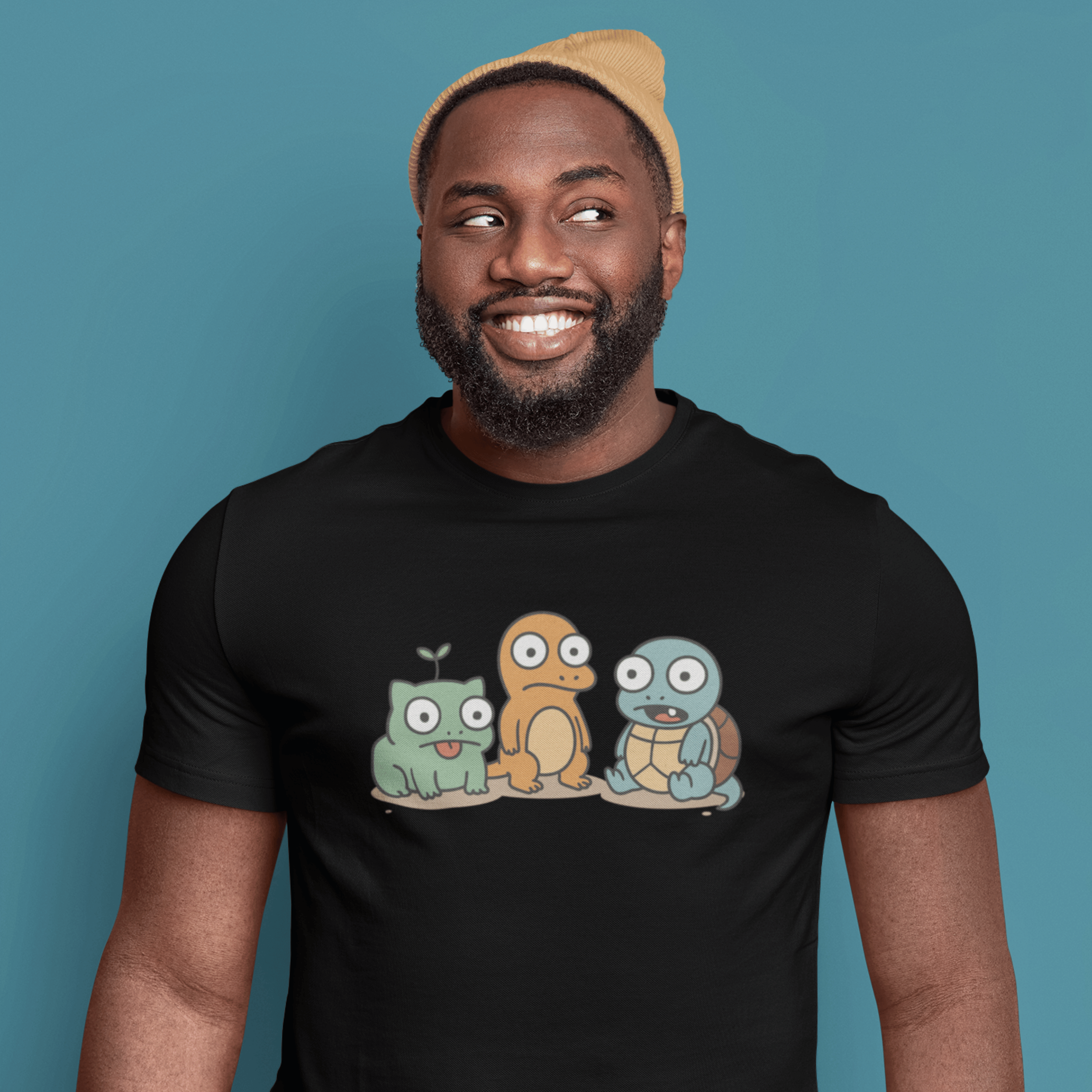 close up of man wearing funny pokemon t-shirt with derpy starters