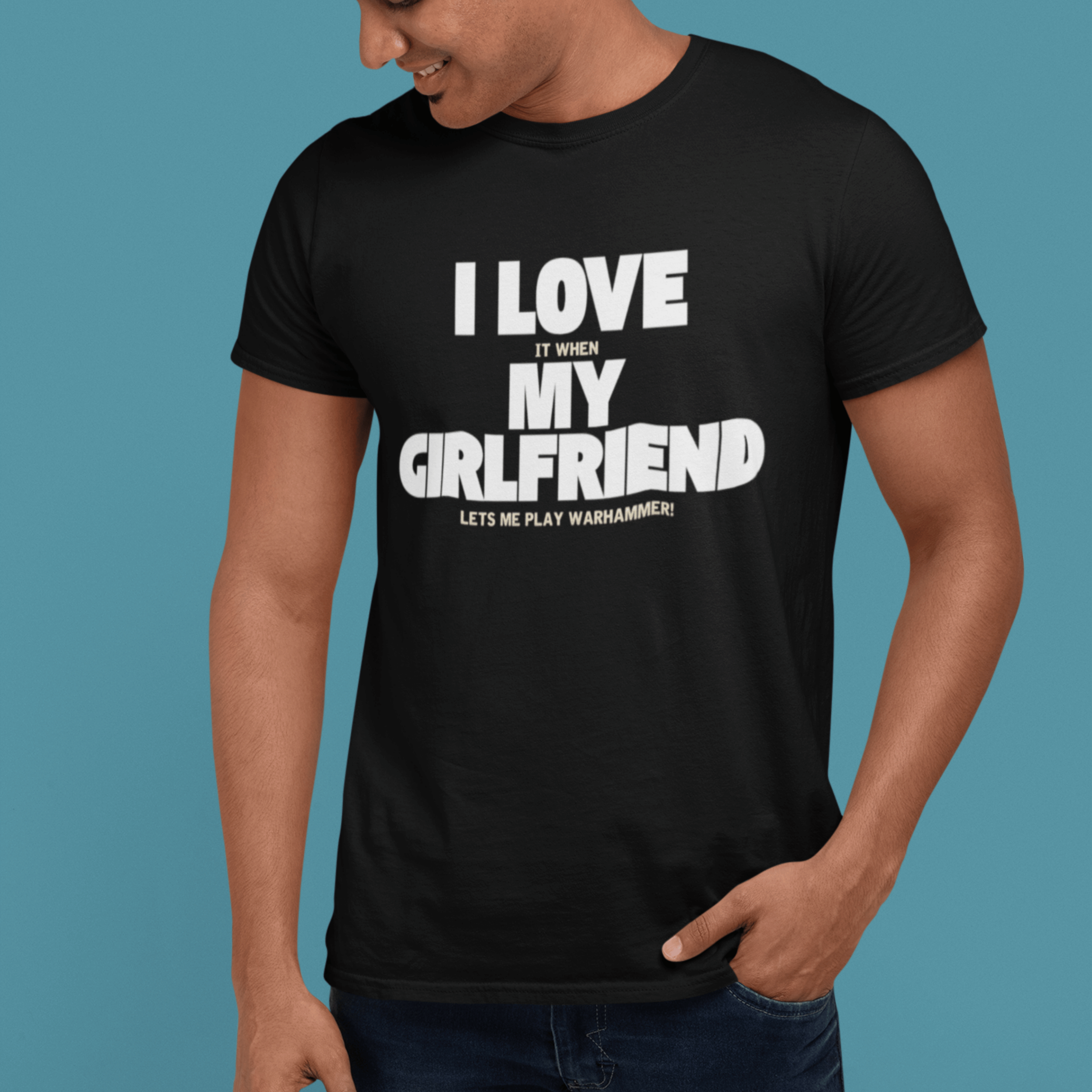 close up of man wearing Funny warhammer t-shirt for boyfriend with slogan "I love it when my girlfriend lets me play warhammer!"