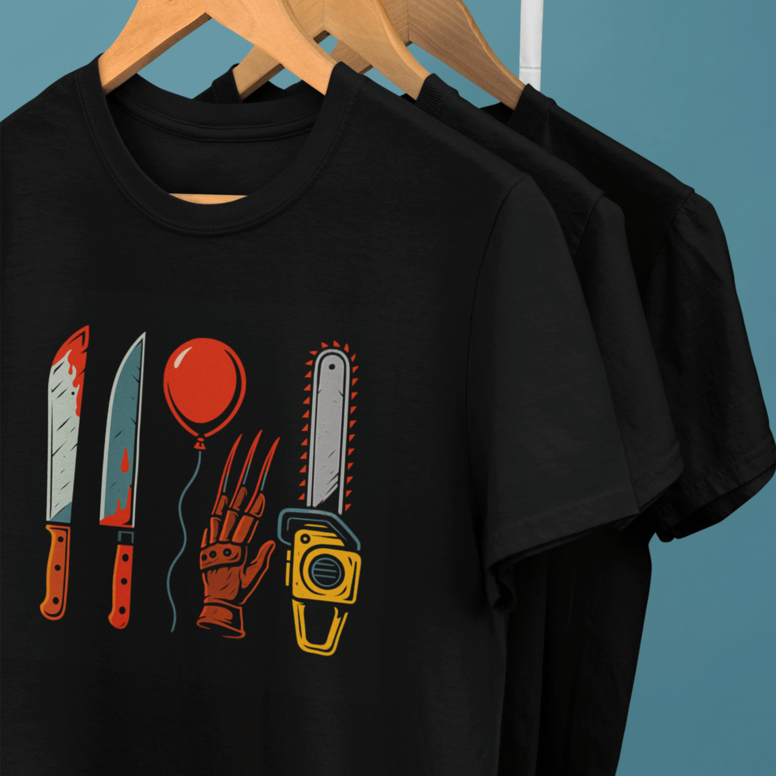 clothes rack of Horror movie villain weapons tshirts