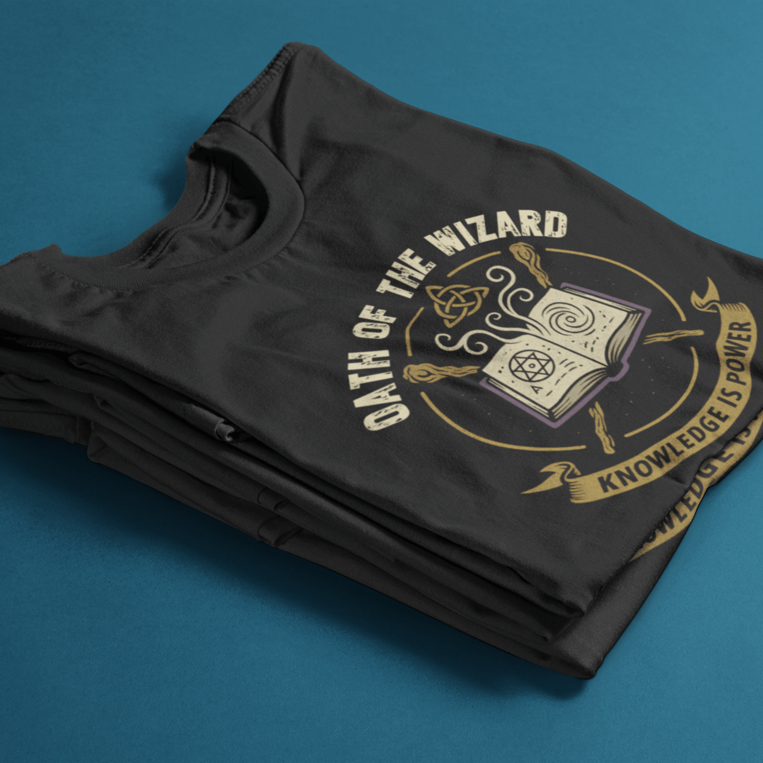 Folded D&D-inspired wizard T-shirt for tabletop RPG players with subtle gaming humour