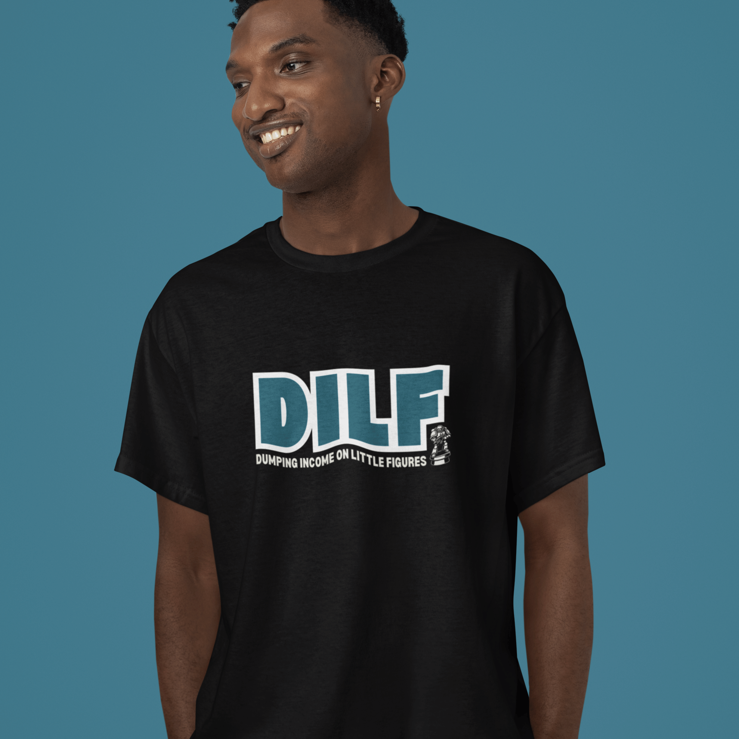 Man wearing funny warhammer 40k tshirt with slogan "DILF: dumping income on little figures"