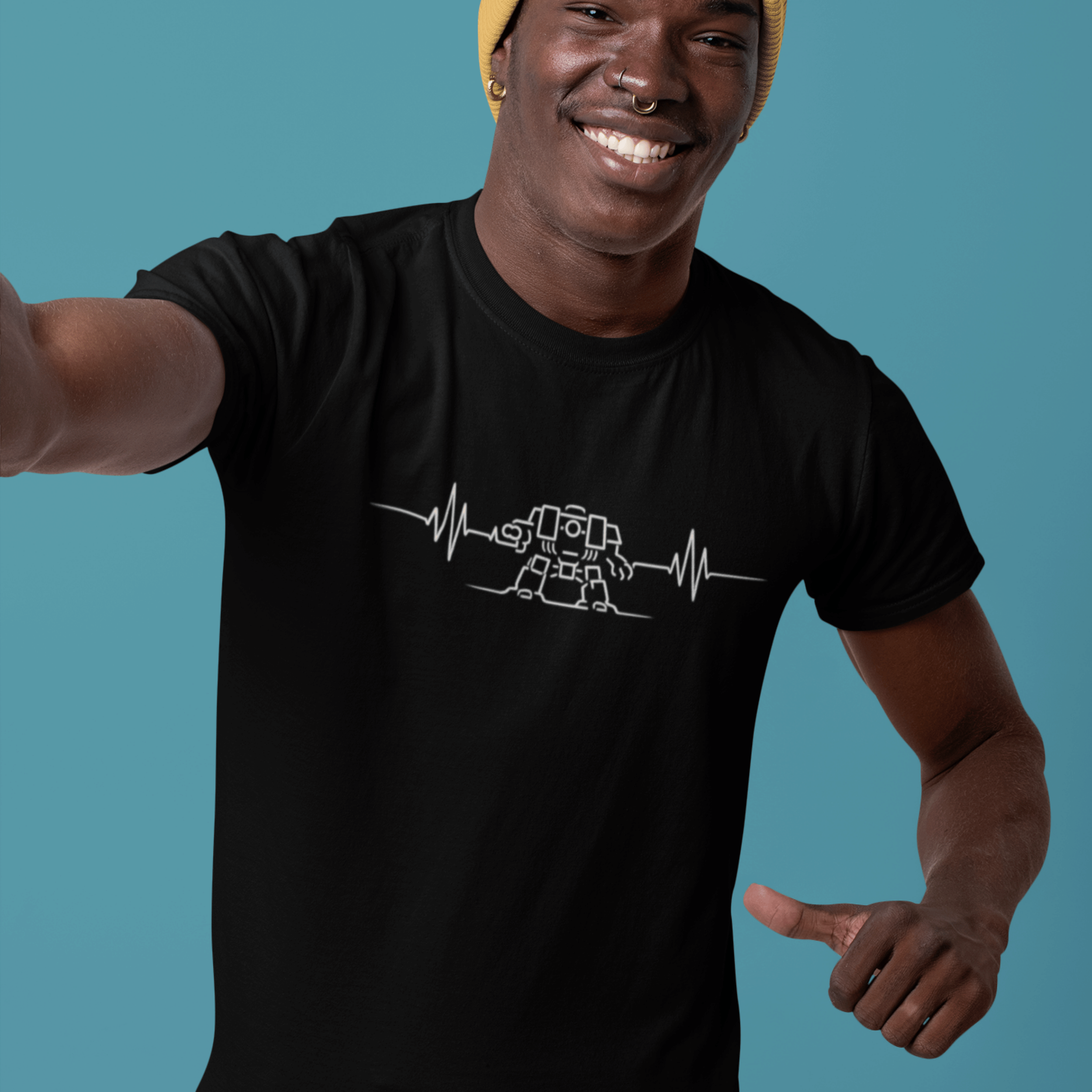 man in beanie smiling and wearing Funny warhammer t-shirt with dreadnought pulse for wargamers who live and breathe 40K