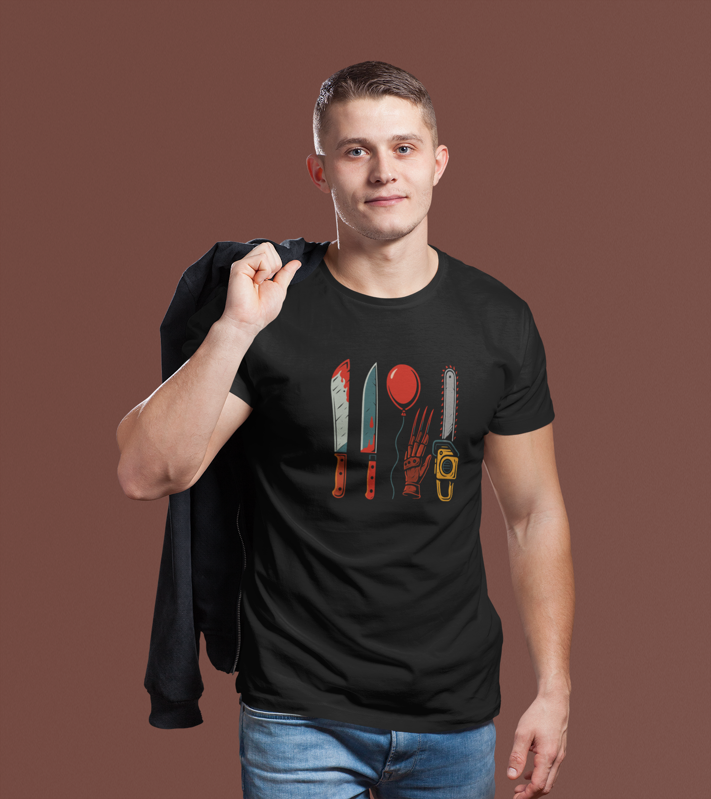 tee-mockup-of-a-man-holding-another-garment-over-his-shoulder-2978-el1.png