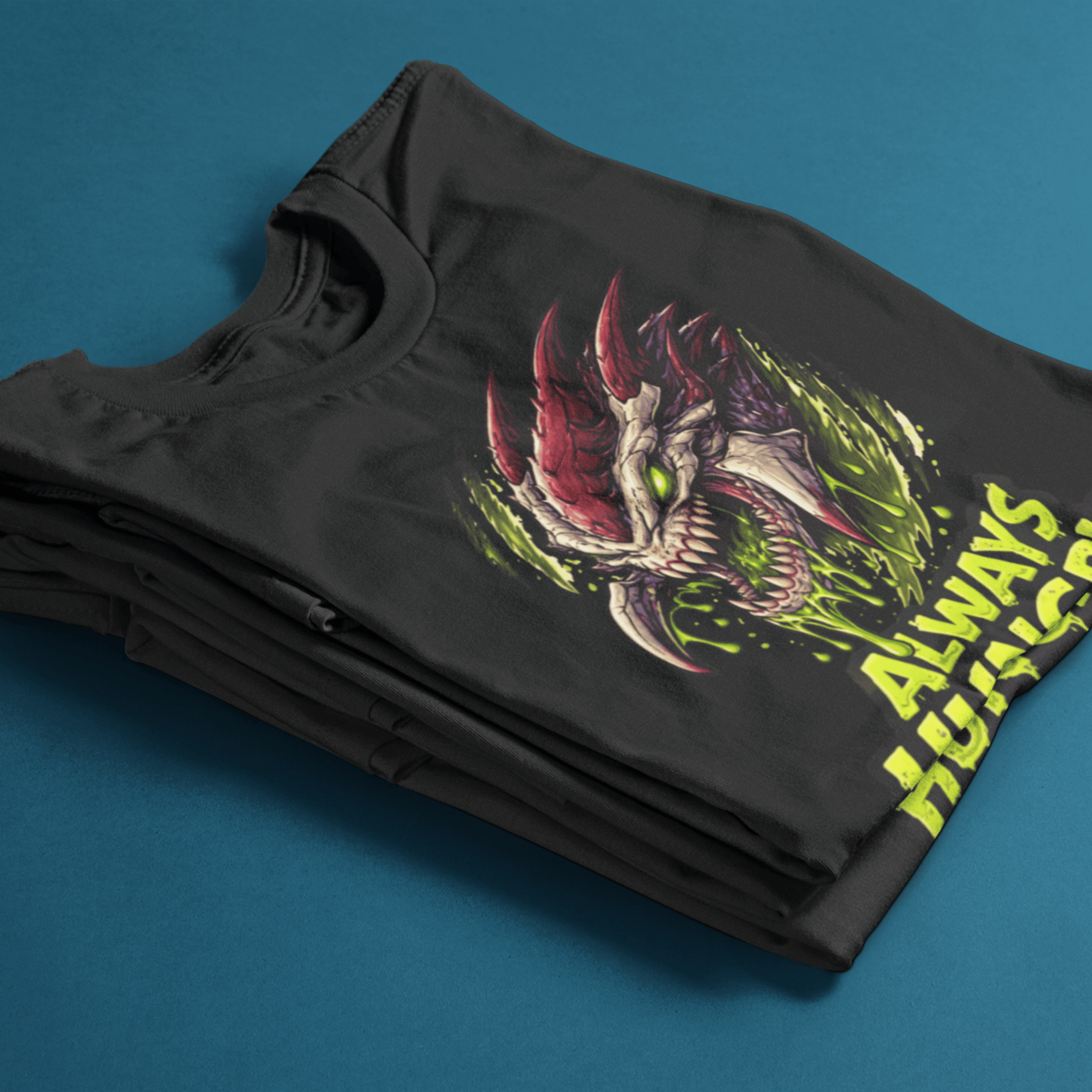 folded Warhammer 40k Tyranids t-shirt with "Always Hungry" slogan