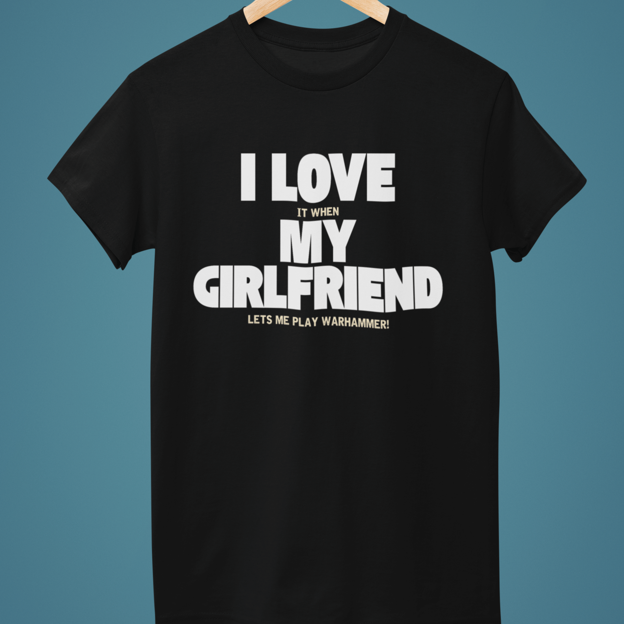 black Funny warhammer t-shirt for boyfriend with slogan "I love it when my girlfriend lets me play warhammer!"