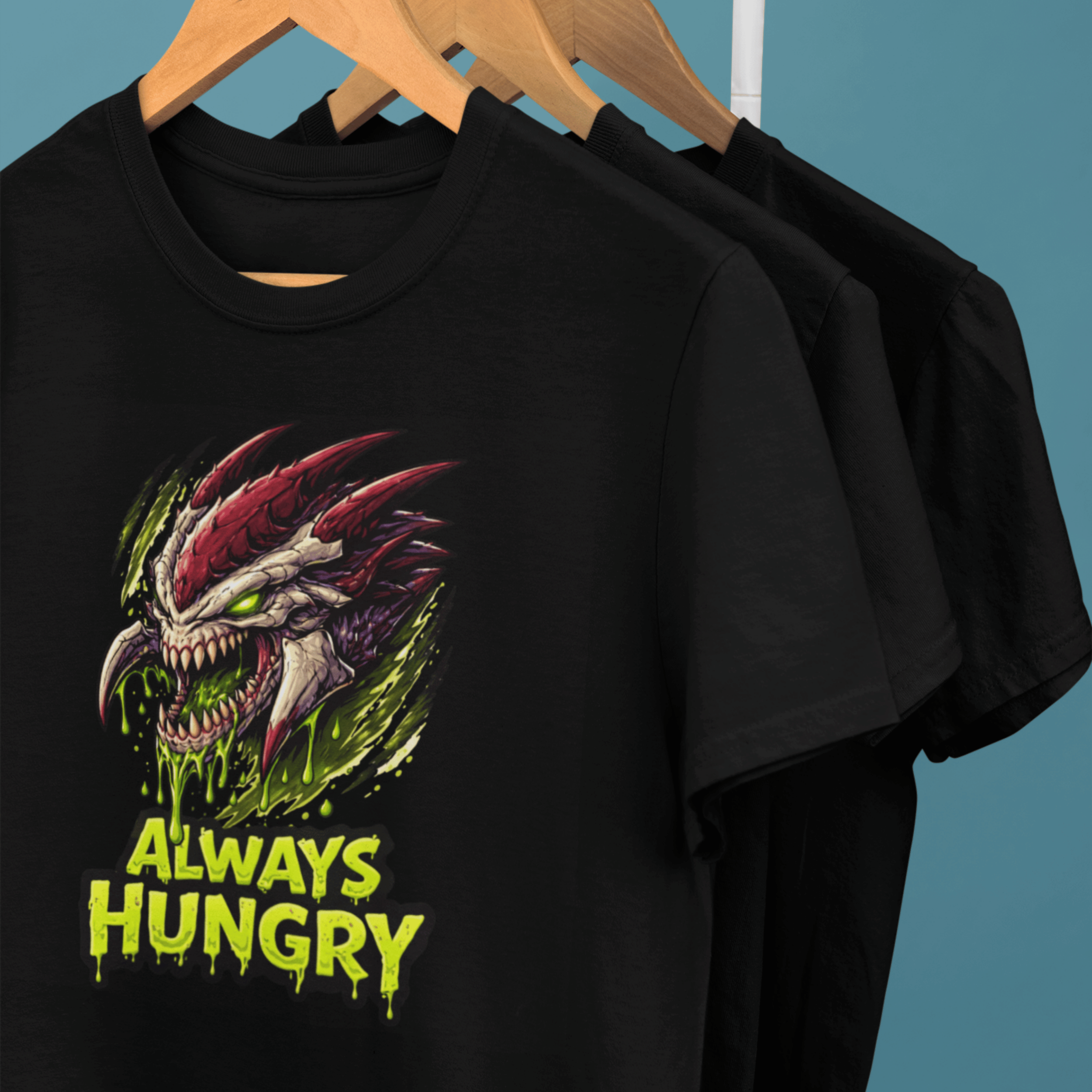 clothes rack of Warhammer 40k Tyranids t-shirts with "Always Hungry" slogan