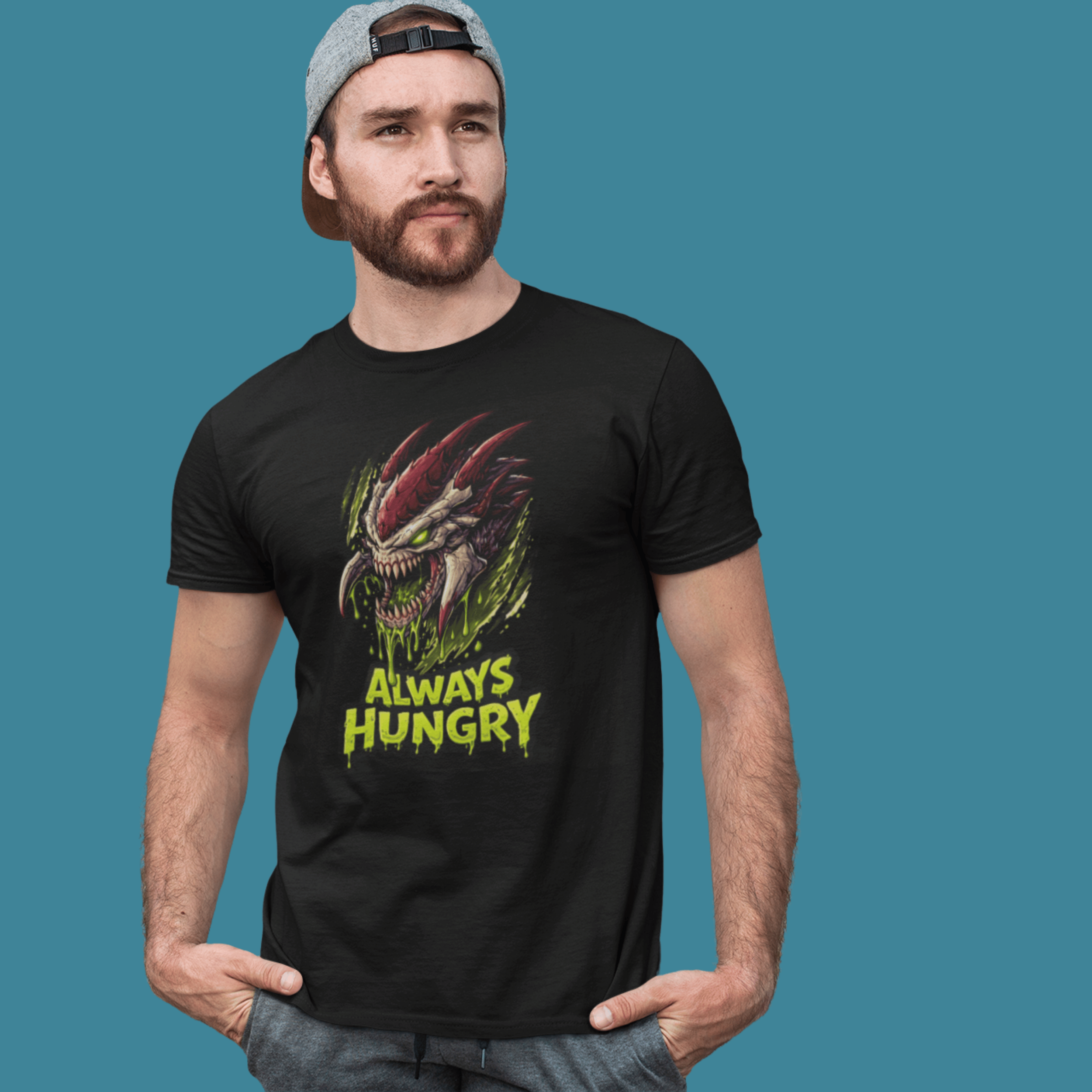 close up of man wearing Warhammer 40k Tyranids t-shirt with "Always Hungry" slogan