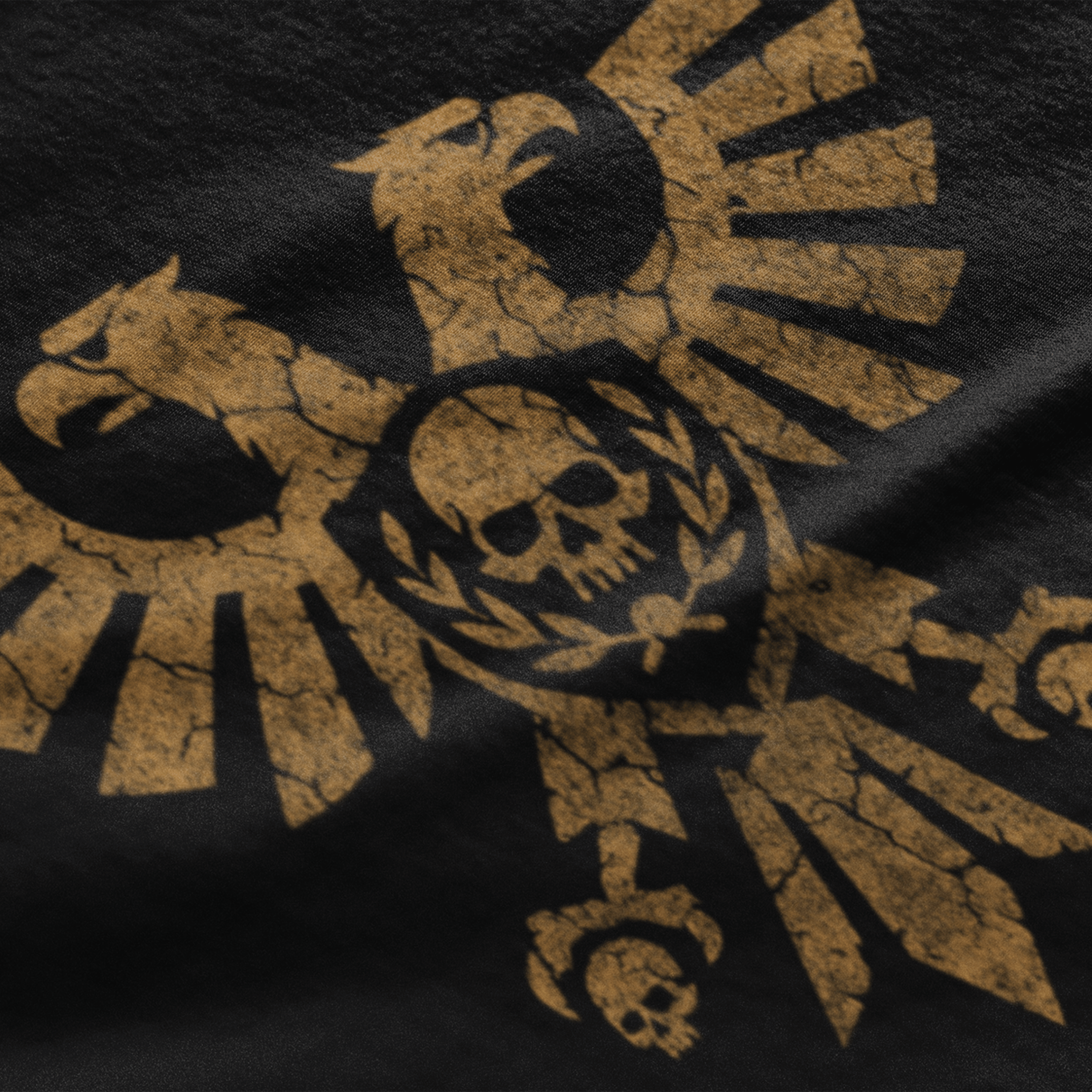 close up of Warhammer 40k tshirt with gold aquila symbol in gold
