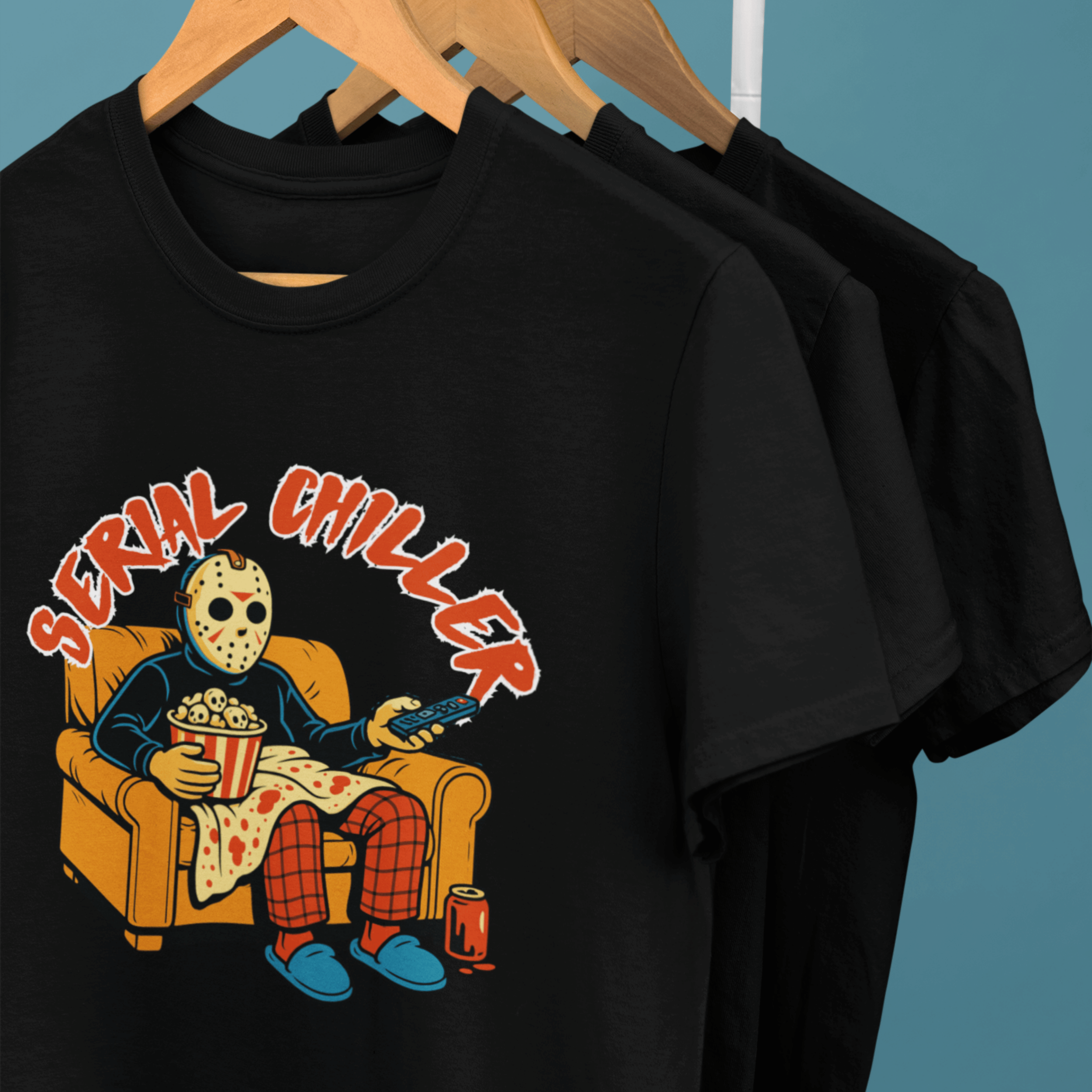 clothes rack of horror movie lover t-shirts with jason vorhees watching slasher movies