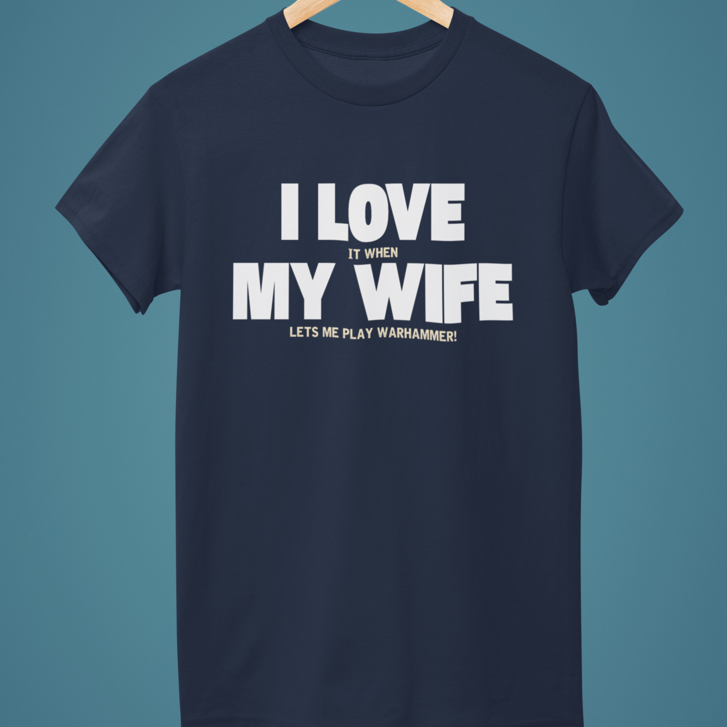 Navy Funny Warhammer t-shirt for husbands with wording "I love it when my wife lets me play warhammer!"