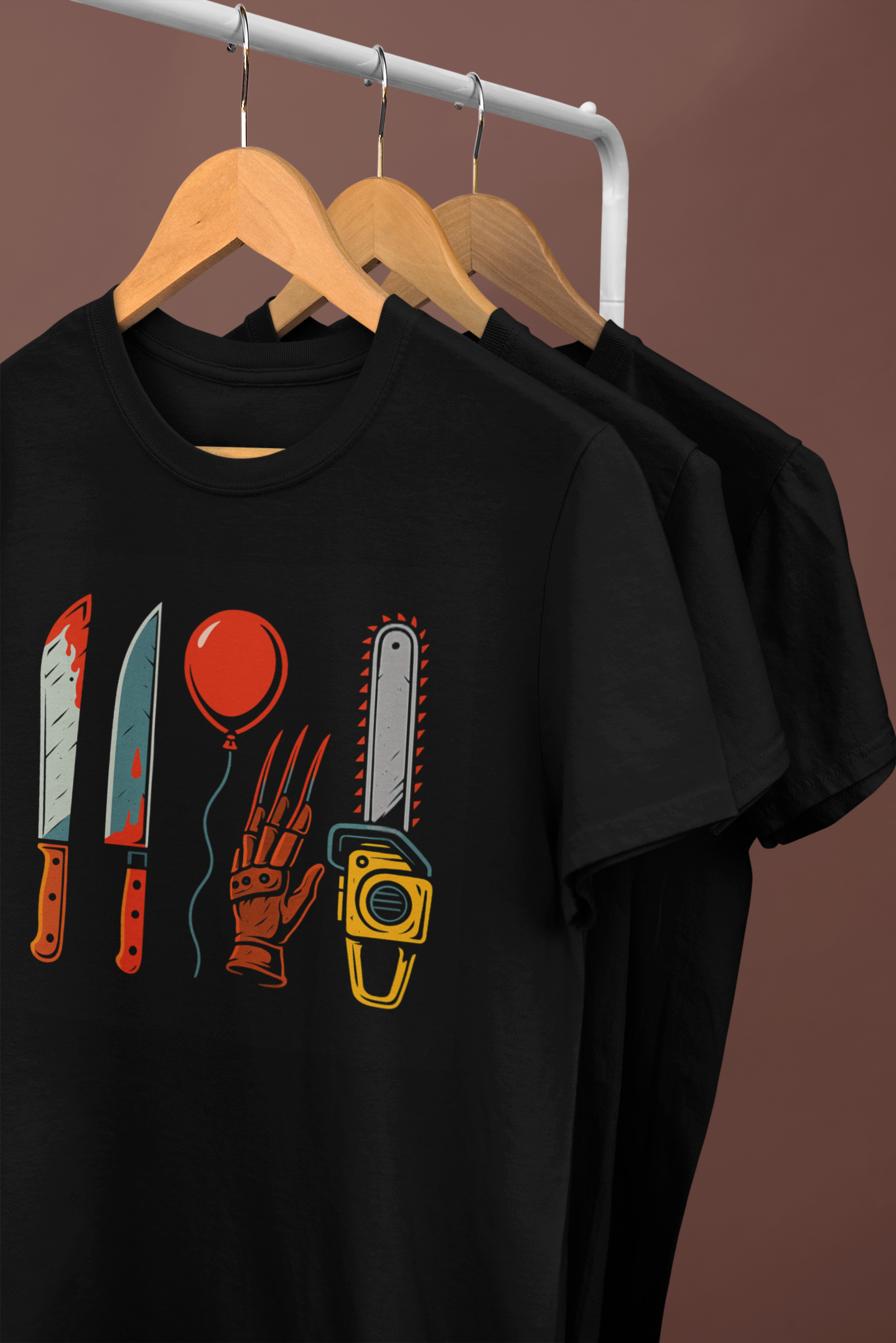 mockup-of-a-series-of-t-shirts-hanging-from-a-rack-34002 (12).png