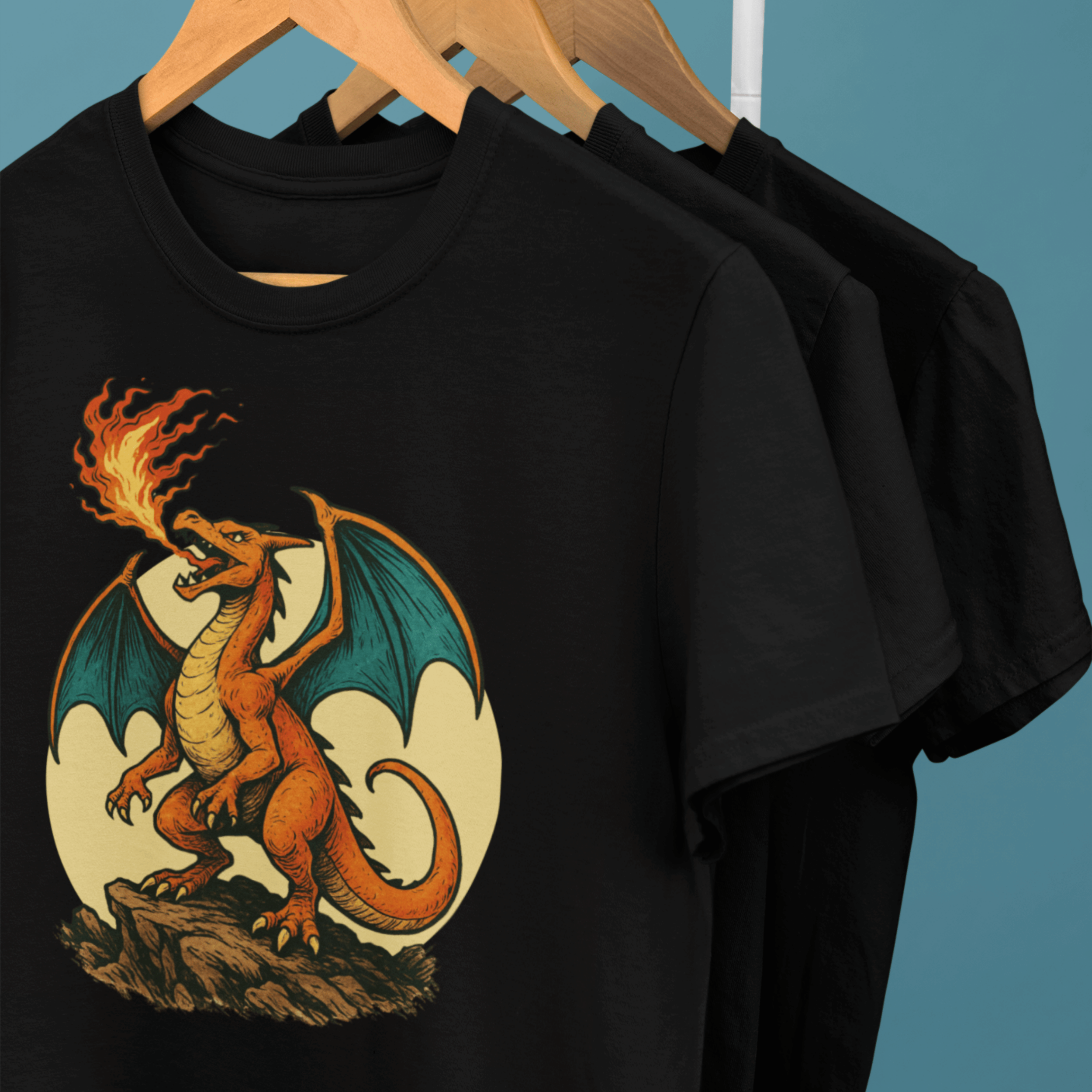 clothes rack of Pokemon t-shirts with fantasy style charizard dragon