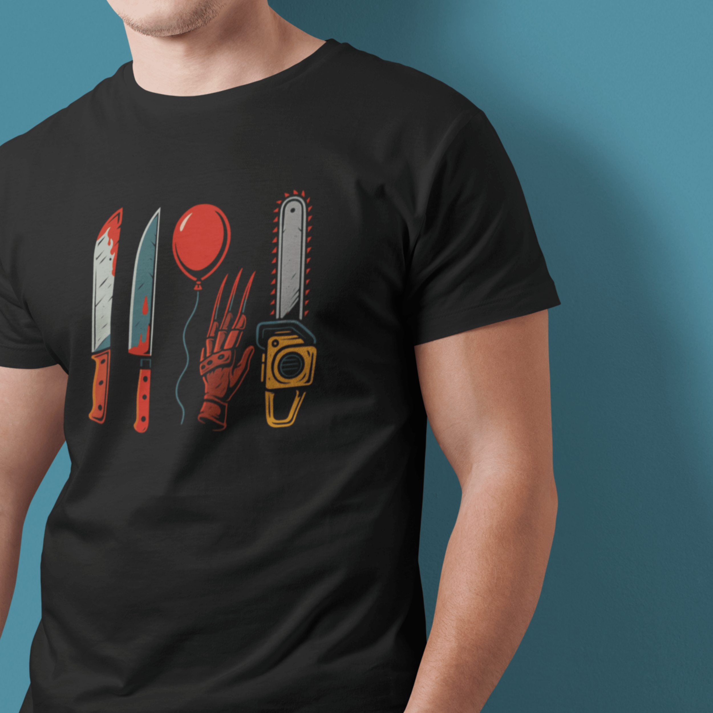 man wearing Horror movie villain weapons tshirt