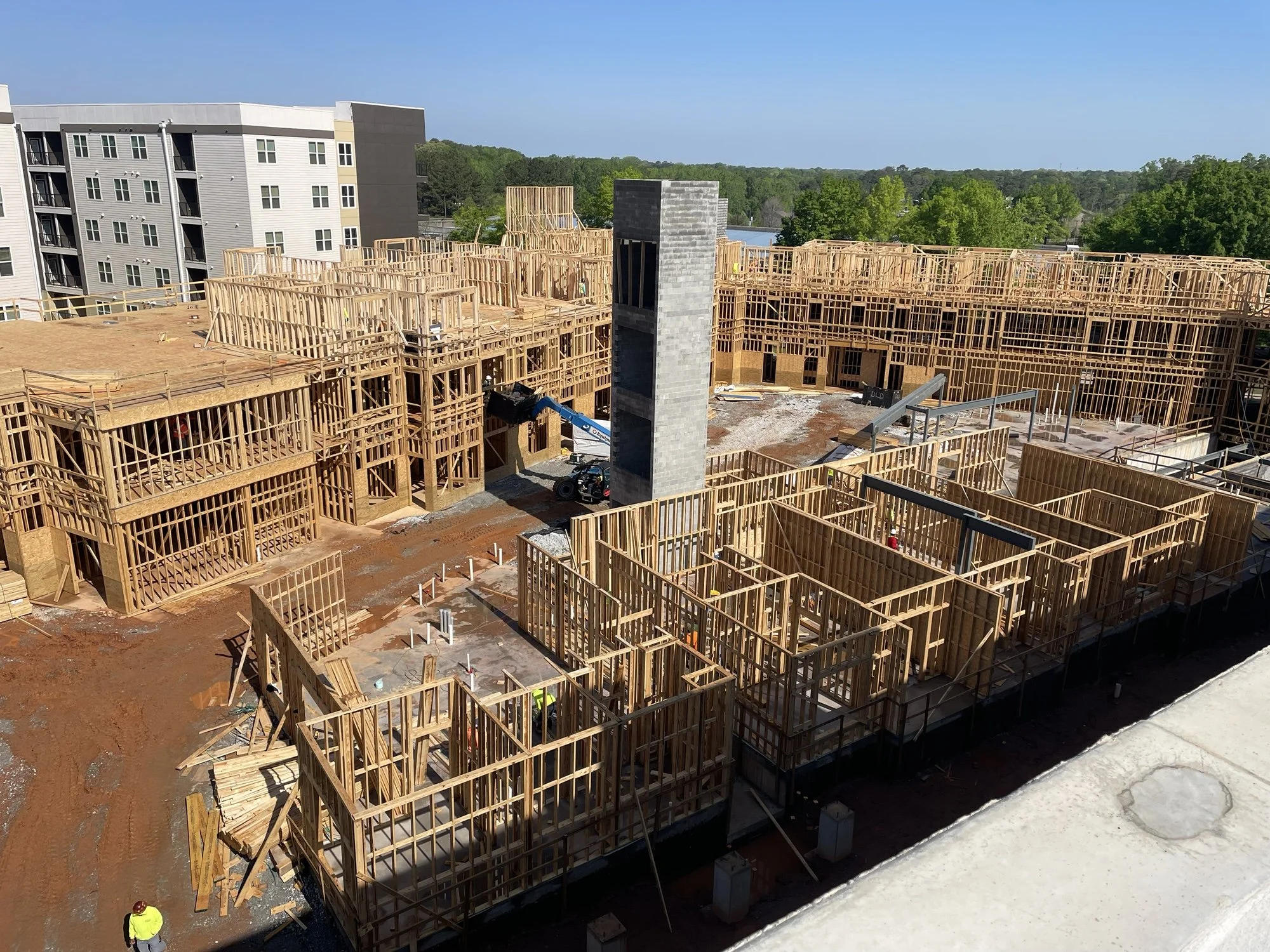 Multifamily construction in progress with wood framing for an EarthCraft Certified apartment development built by TuckerCraft.