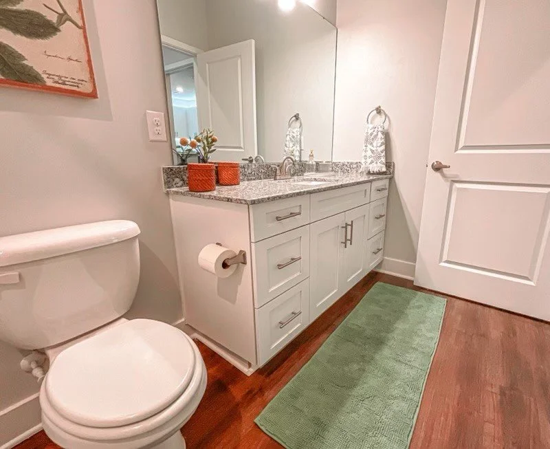 Typical bathroom with a tub, toilet and sink in the Courtney Ridge multifamily apartment complex - Charlotte, NC
