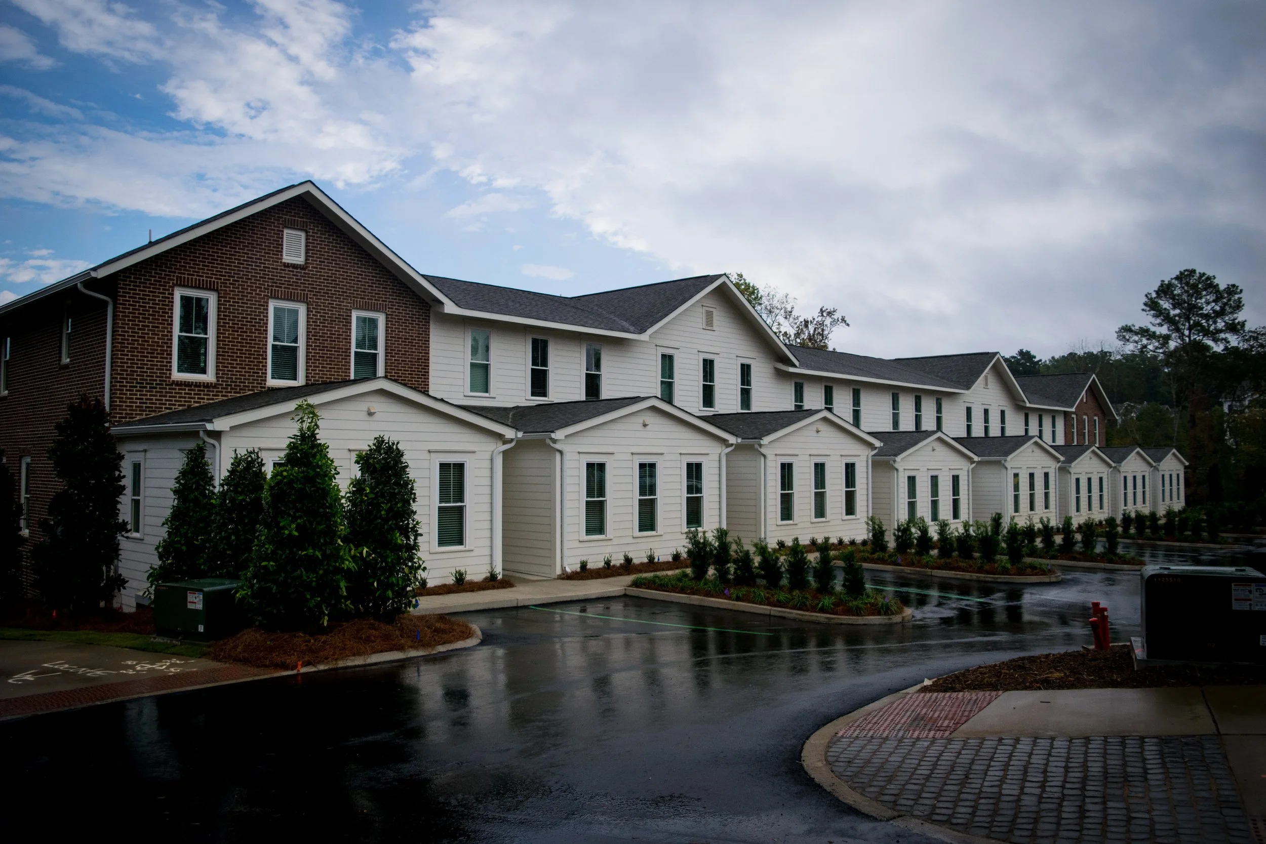 Exterior shot of the rear of the buildings in the Old Town Townhomes multifamily townhome complex - Columbus, GA