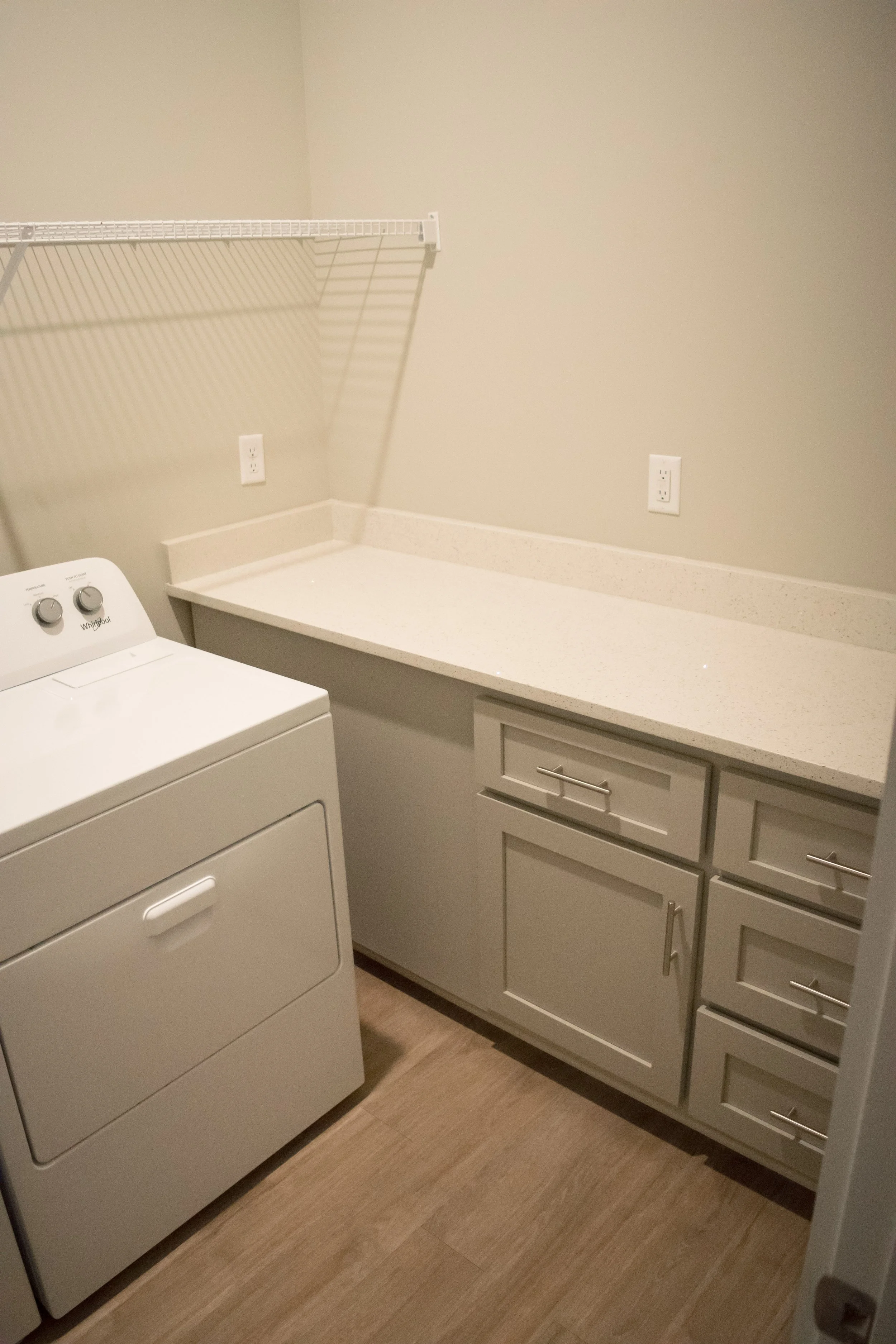 A typical laundry room in the multifamily townhome complex Old Town Townhomes - Columbus, GA