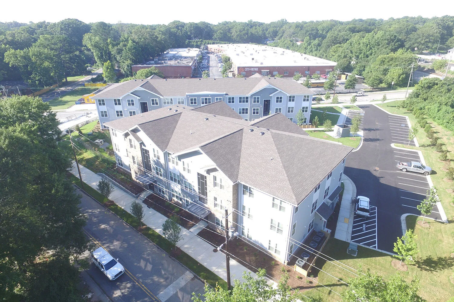 Overhead shot of several multifamily apartment buildings at City of Refuge - Atlanta, GA