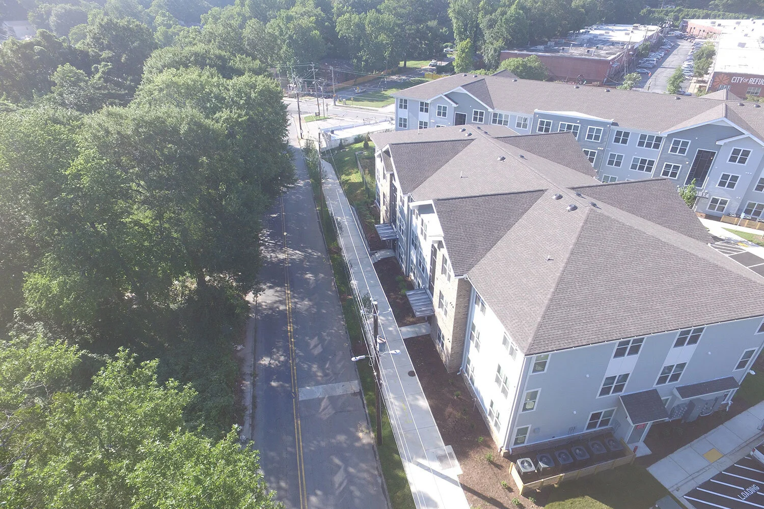 Overhead shot of several multifamily apartment buildings at City of Refuge - Atlanta, GA