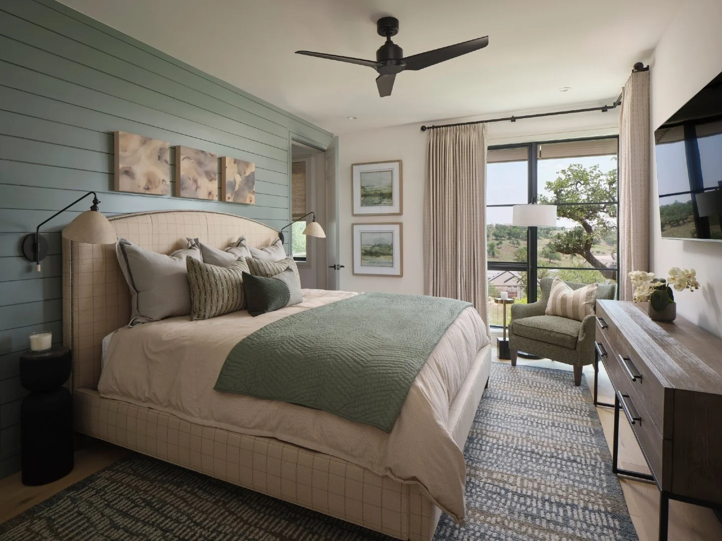 Design Challenge: Fitting a king-size bed and functional nightstands on a compact wall framed by doorways.

Our Solution: We selected a king bed with a minimal footprint beyond the mattress itself, maximizing every inch of space without sacrificing c