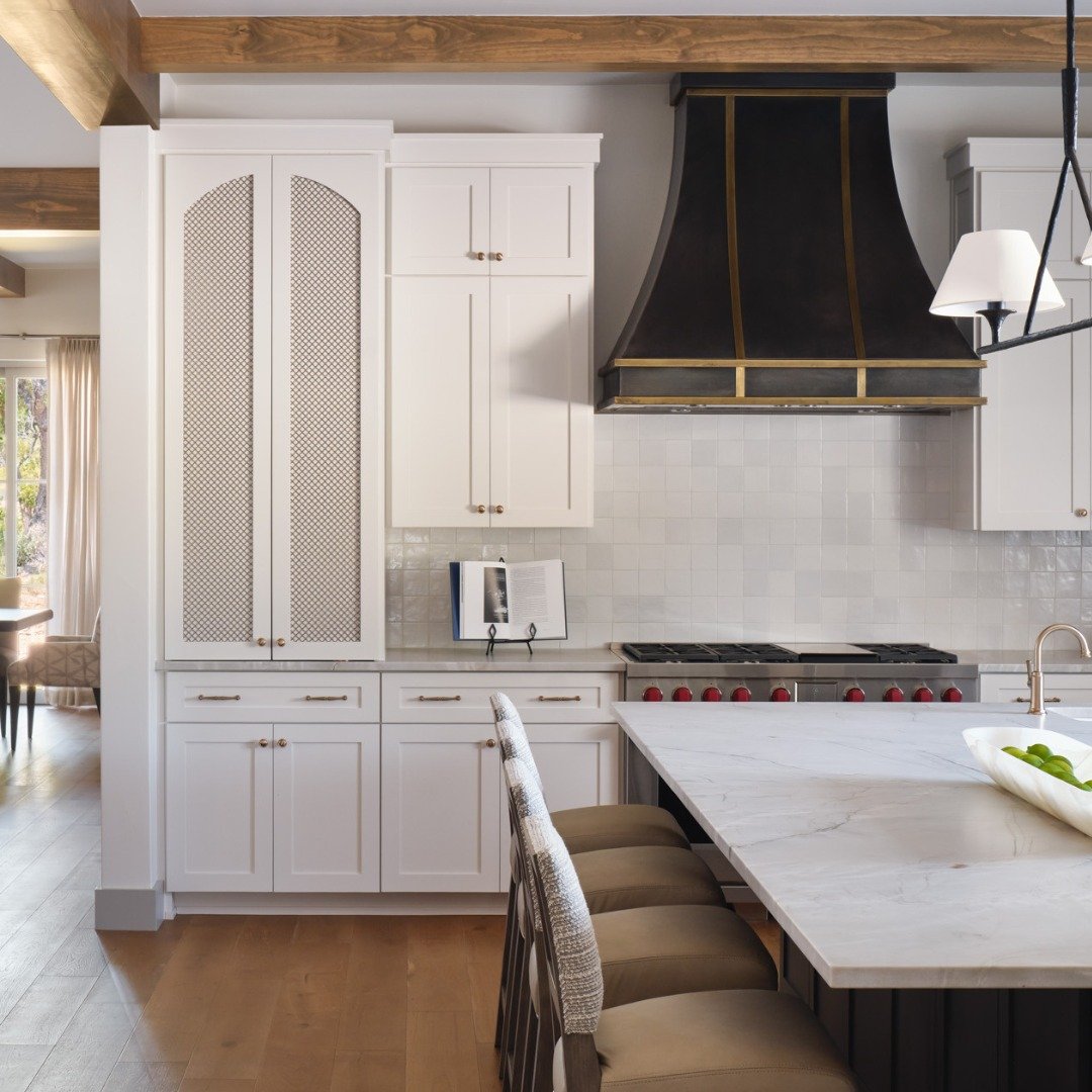 A beautiful statement hood that was truly a collaborative effort. 

We had the opportunity to work closely with the general contractor to reimagine the kitchen range hood, transforming it from a simple plaster design into this striking metal feature.