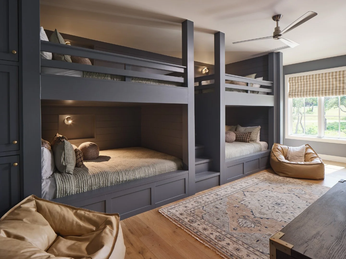 Room for today, tomorrow, and every visit in between!
 
These custom queen-over-queen bunks were designed to grow with the family, offering plenty of space for children of all ages and extended family members alike. Each nook is thoughtfully outfitte