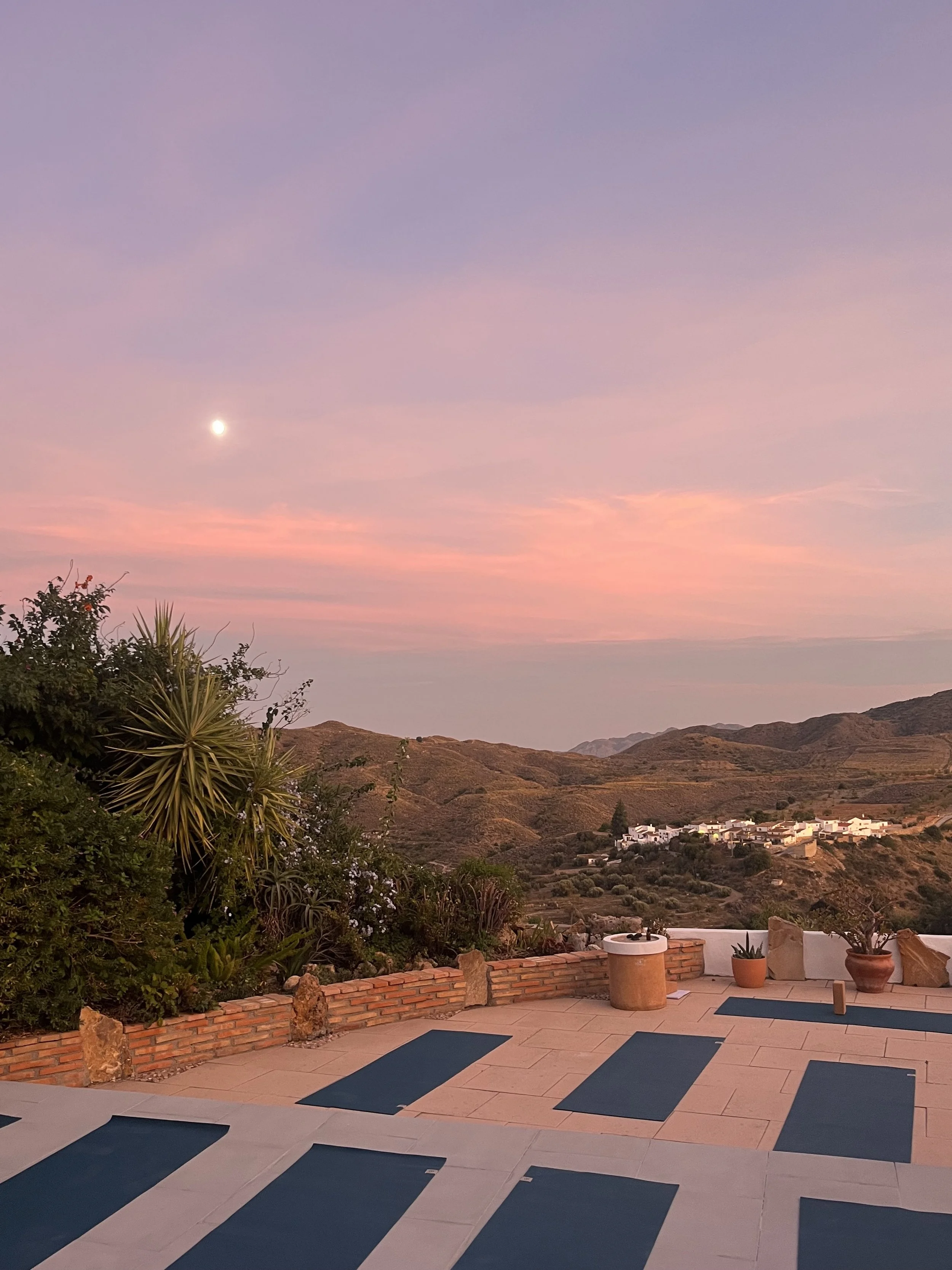 Students preparing for an evening vinyasa yoga  during a retreat