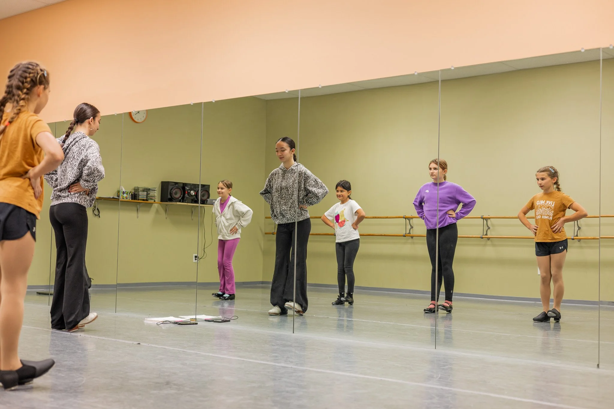 tap instructor teaching young students