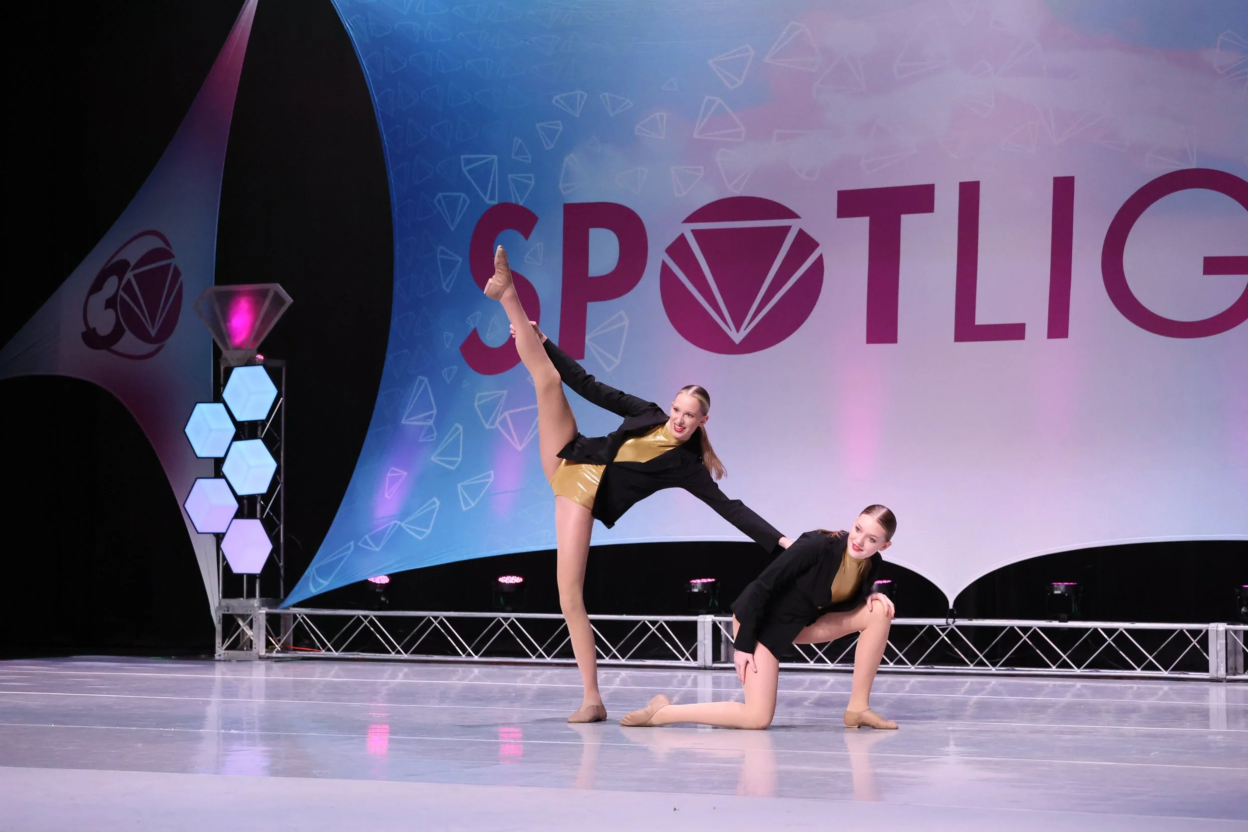dancers performing jazz on stage