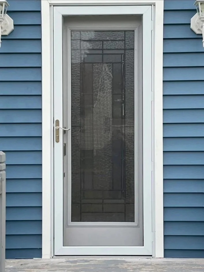 Decorative glass exterior door installed by King Construction for customer Rick Gurney.