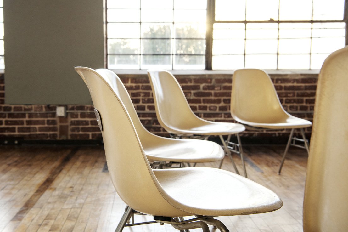 Chairs arranged in a circle for Quaker worship, symbolizing community, equality, and shared discernment.