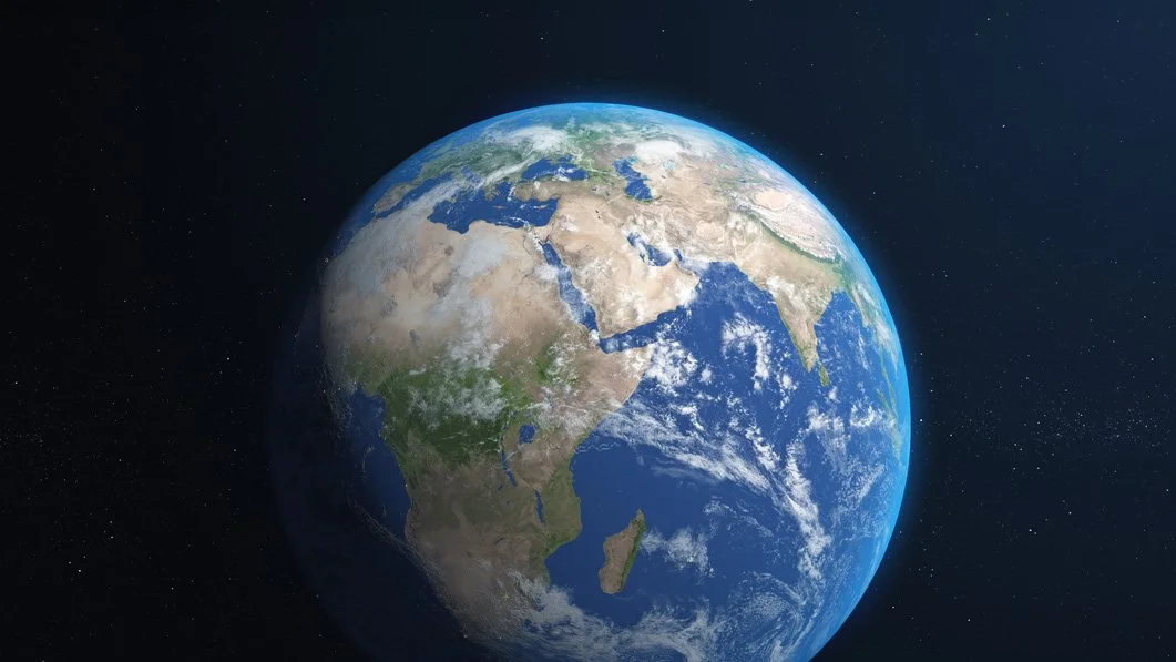 View of Earth from space, symbolizing the Quaker testimony of peace and hope for a world transformed by love.