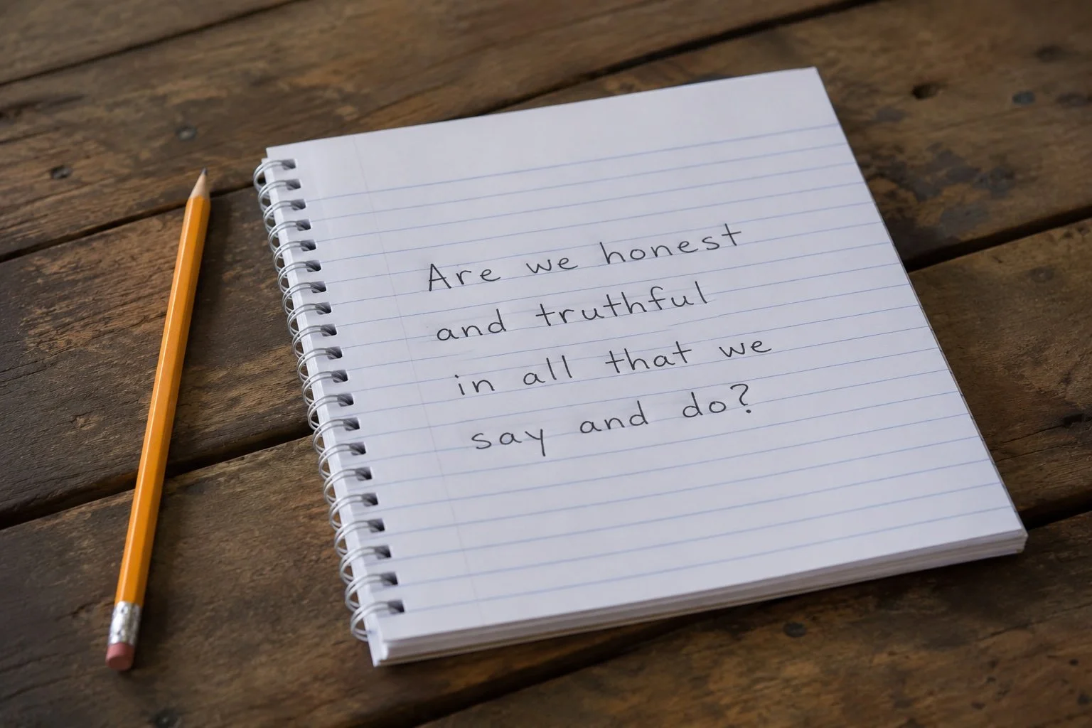 Notebook displaying the Quaker reflection, "Are we honest and truthful in all that we say and do?"