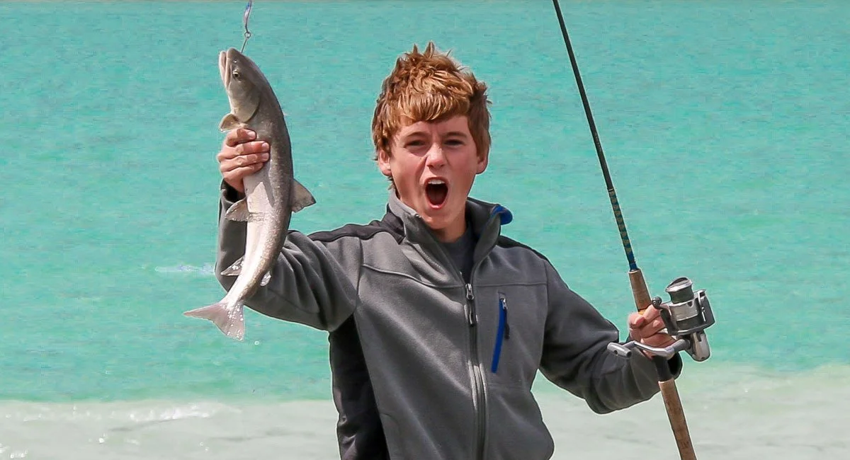 pg 26 - boy fishing, top right .jpg