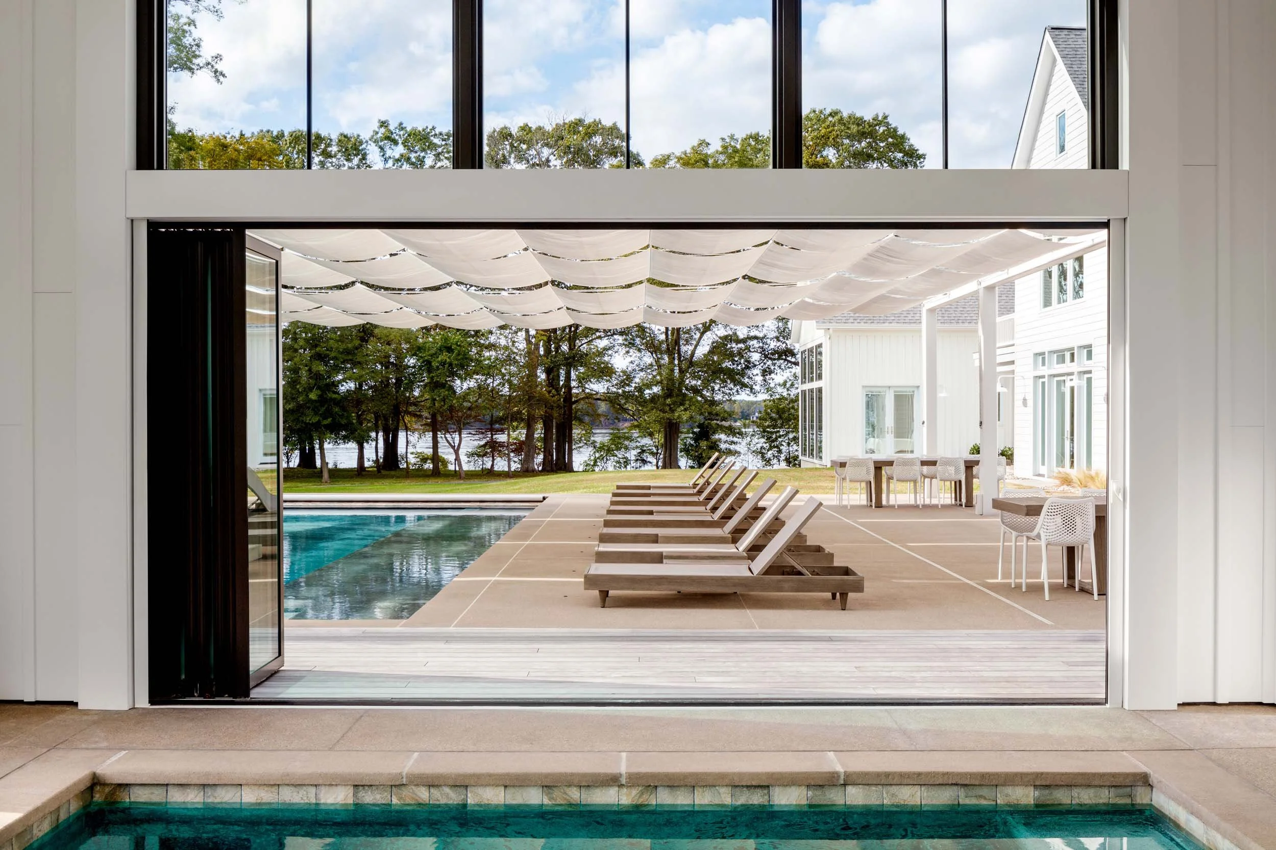 tidewater-farmhouse-chesapeake-indoor-pool-lounge-queenstown-md-kimmel-architects.jpg