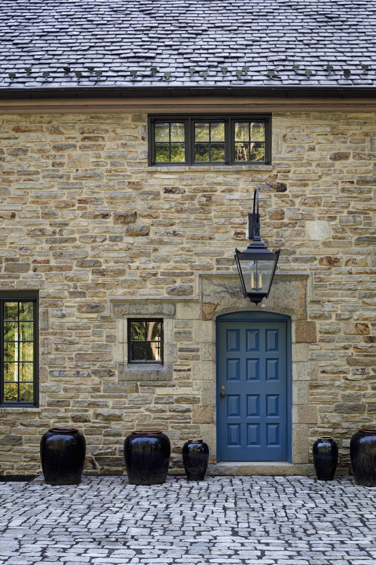 tudor-renovation-stone-facade-blue-door-pikesville-md-kimmel-architects.jpg