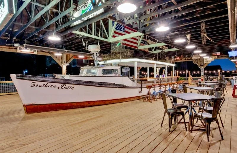 boat-house-deck-dining-tables-deale-md-kimmel-architects.jpg