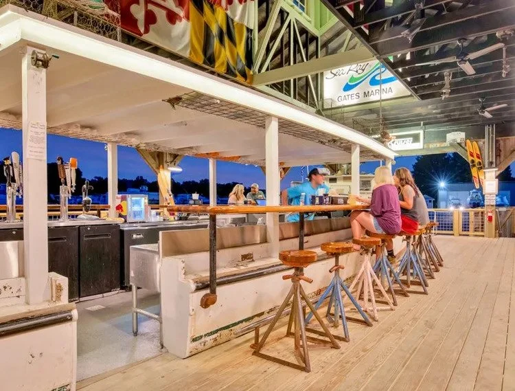 boat-house-nighttime-seating-deale-md-kimmel-architects.jpg