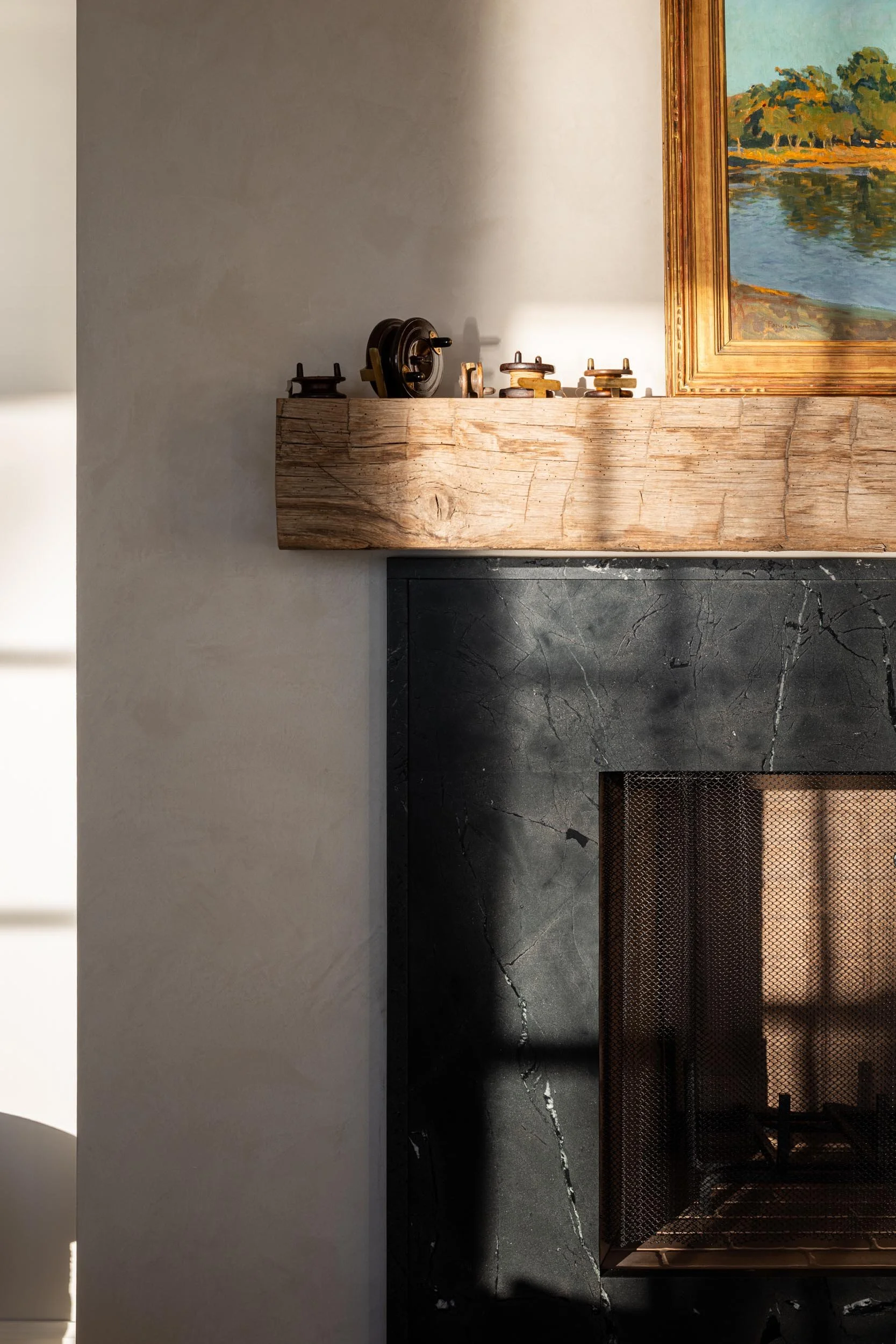 fireplace-detail-black-stone-sunlight-texture-mantel-kimmel-studio-architects.jpg