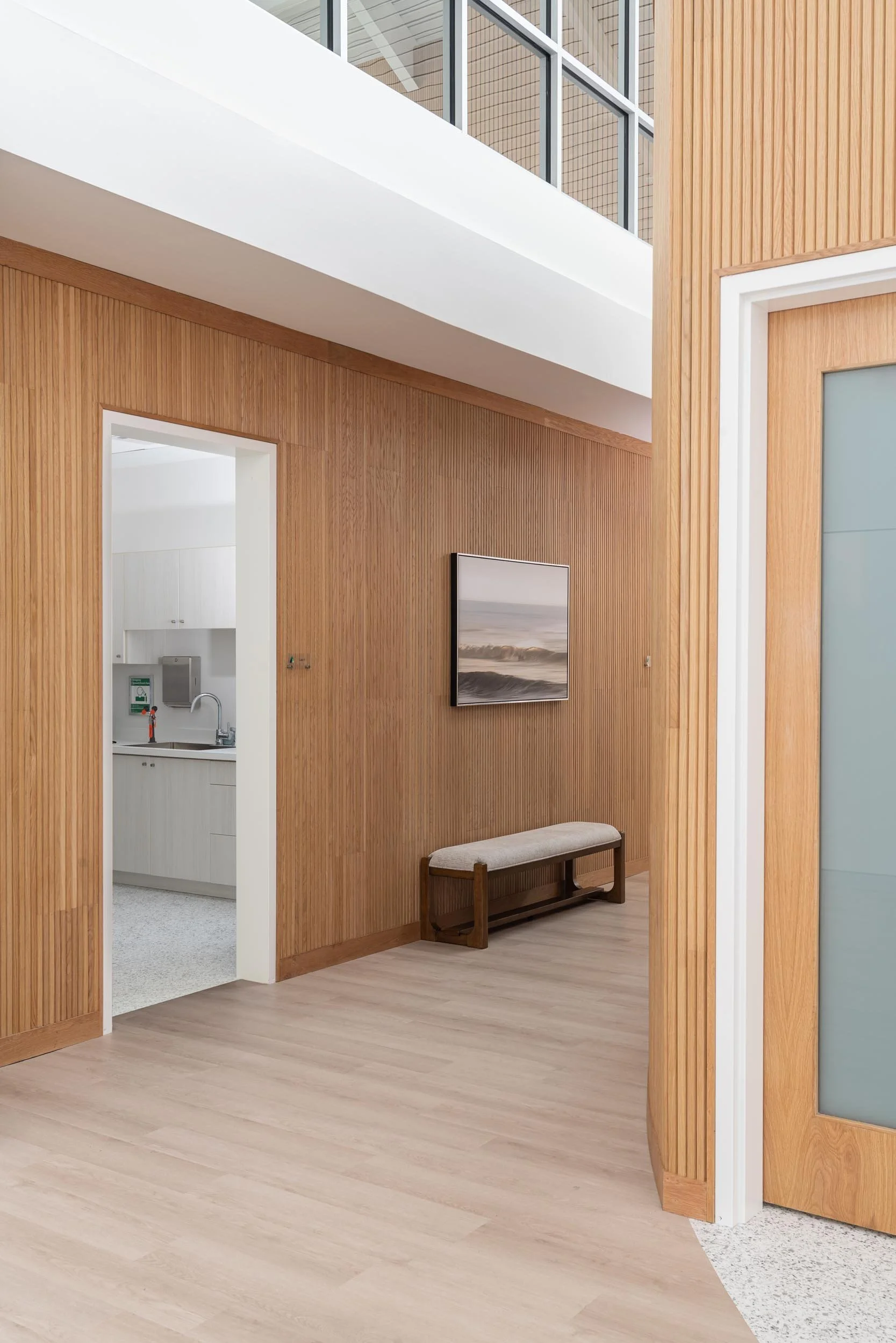 healthcare-hallway-interior-wood-paneling-kimmel-studio.jpg