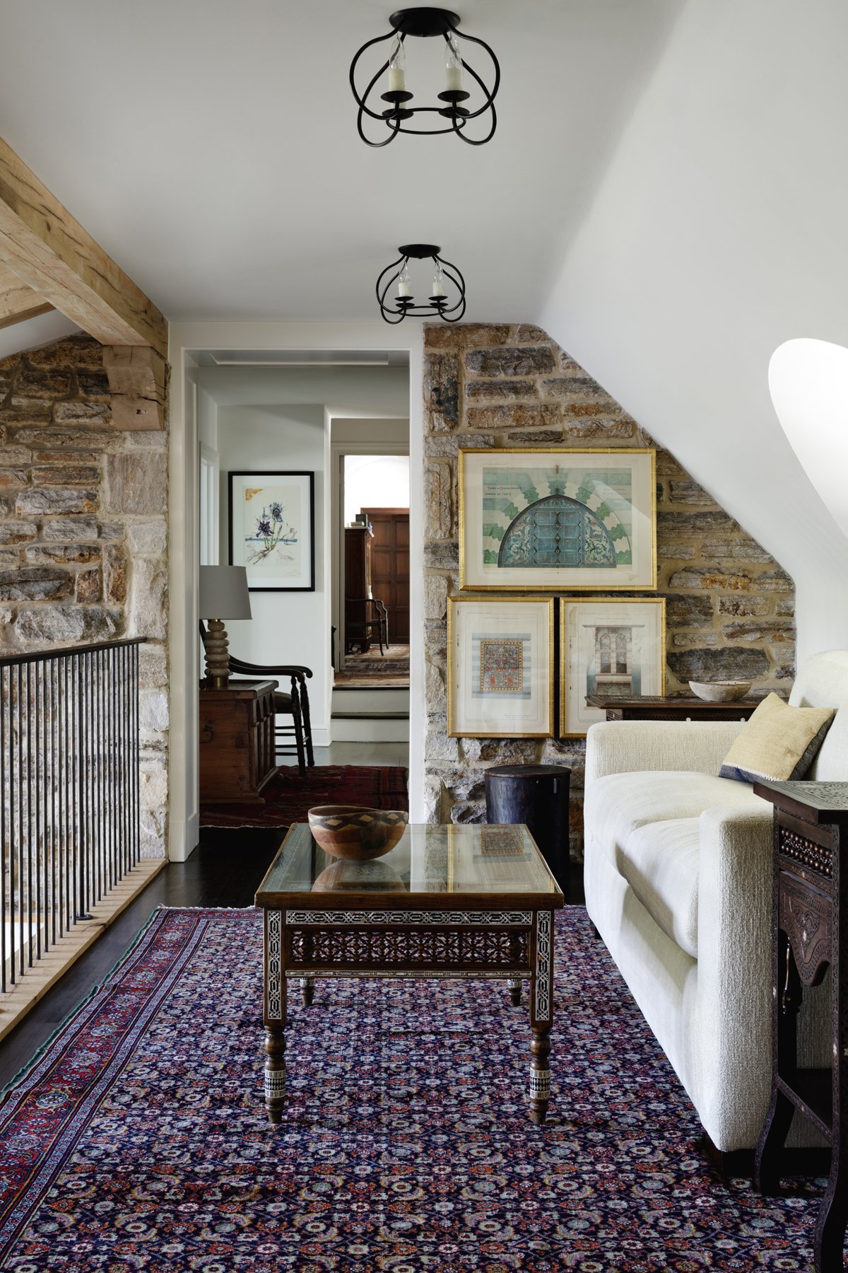 tudor-renovation-stone-hallway-gallery-pikesville-md-kimmel-architects.jpg
