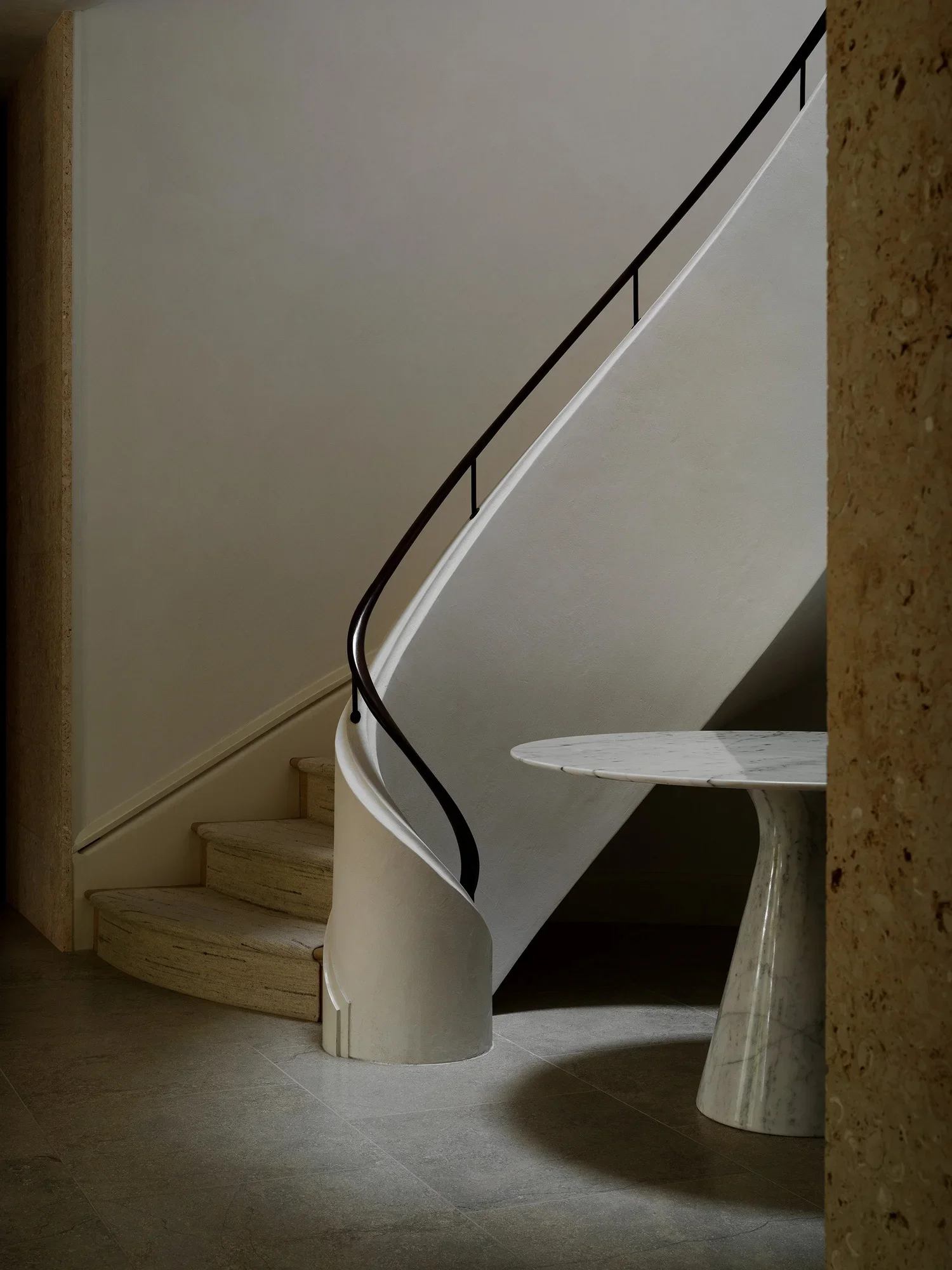 shingle-beach-house-coastal-spiral-staircase-craftsmanship-rehoboth-de-kimmel-architects.webp