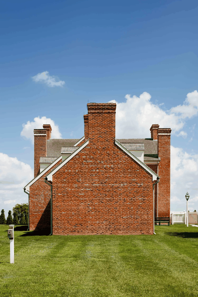 historic-house-renovation-side-brick-courtyard-queenstown-md-kimmel-architects.png