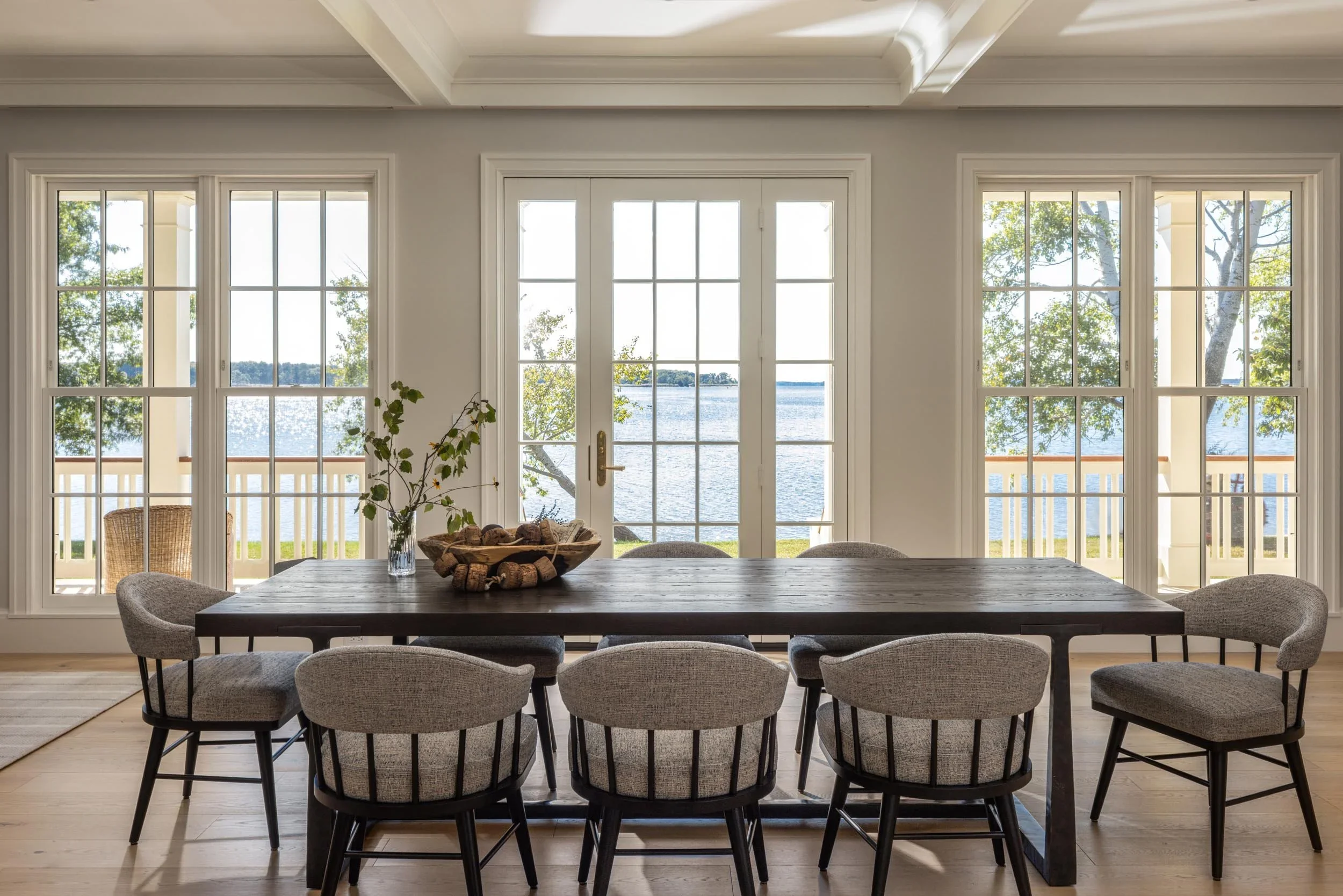 traditional-waterfront-estate-dining-room-large-windows-annapolis-md-kimmel-architects.webp